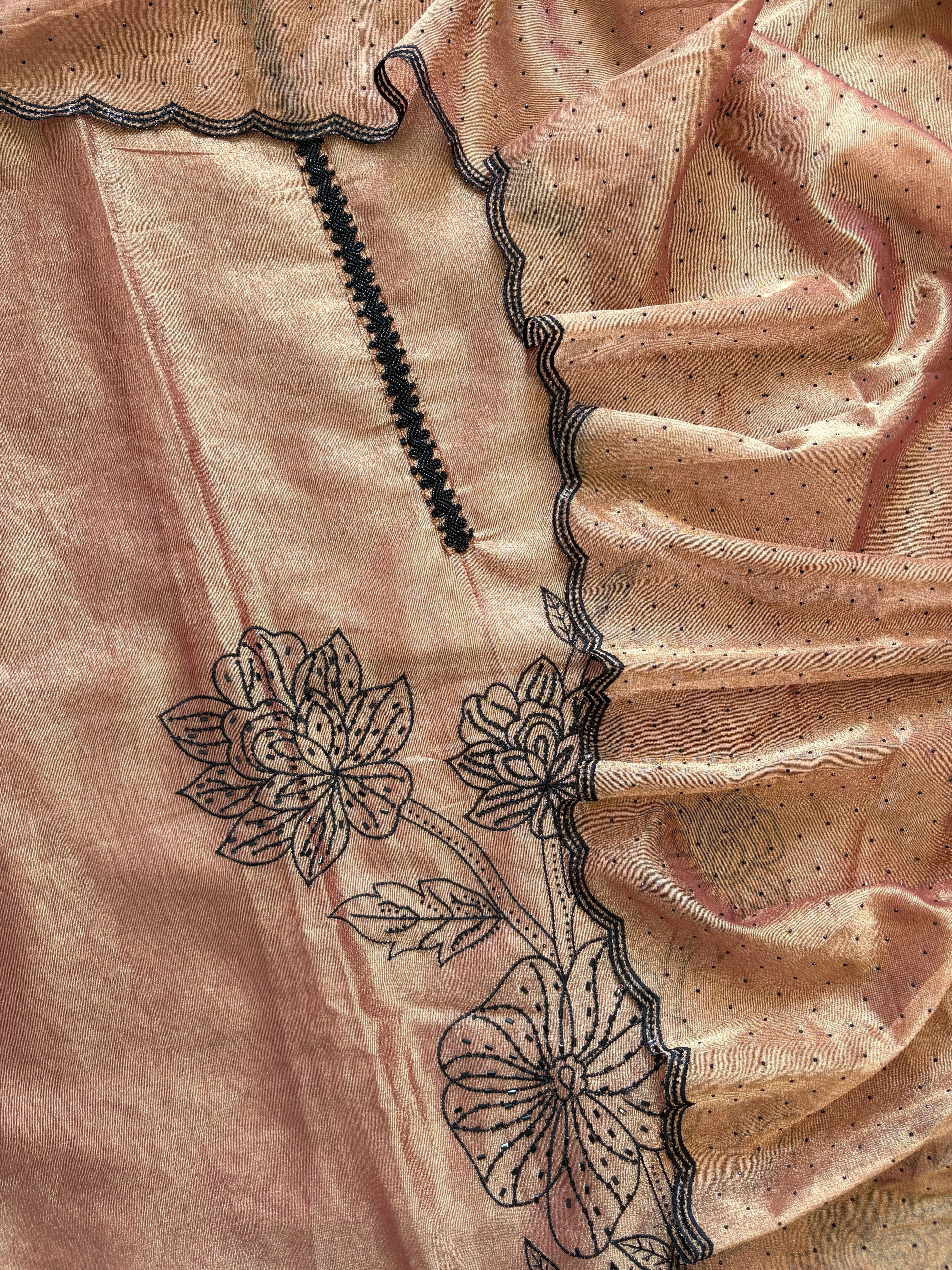 Rust glass tissue suit with intricate embroidery and organza dupatta – luxury ethnic wear for weddings and festive occasions.