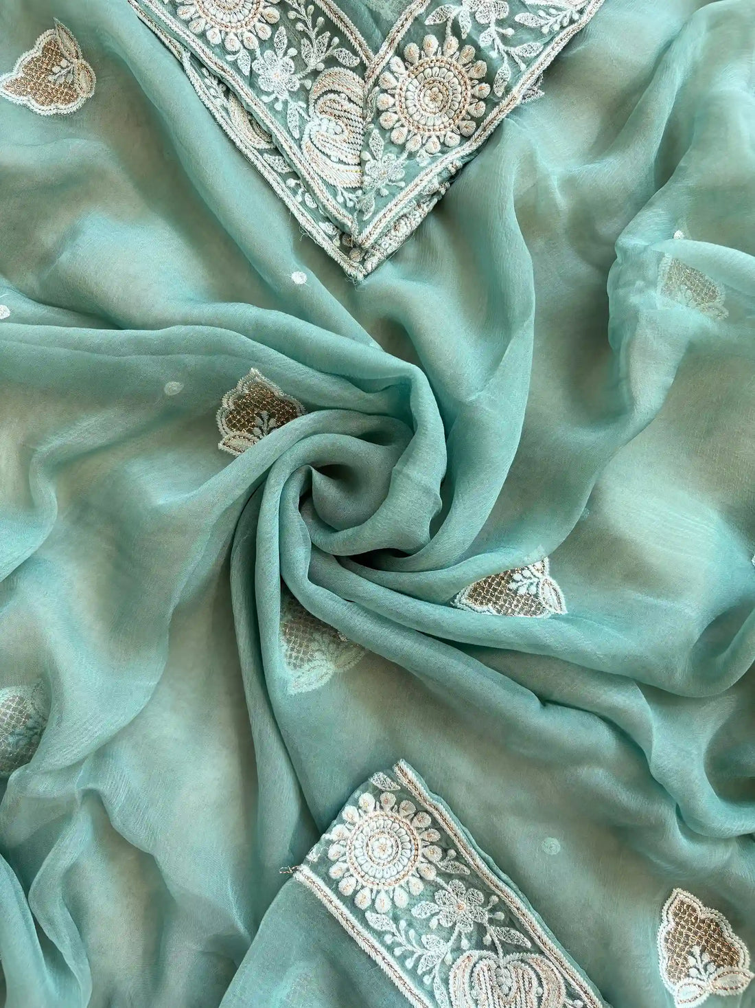 aqua green party wear chikankari unstiched suit with moti and sequence embellishments