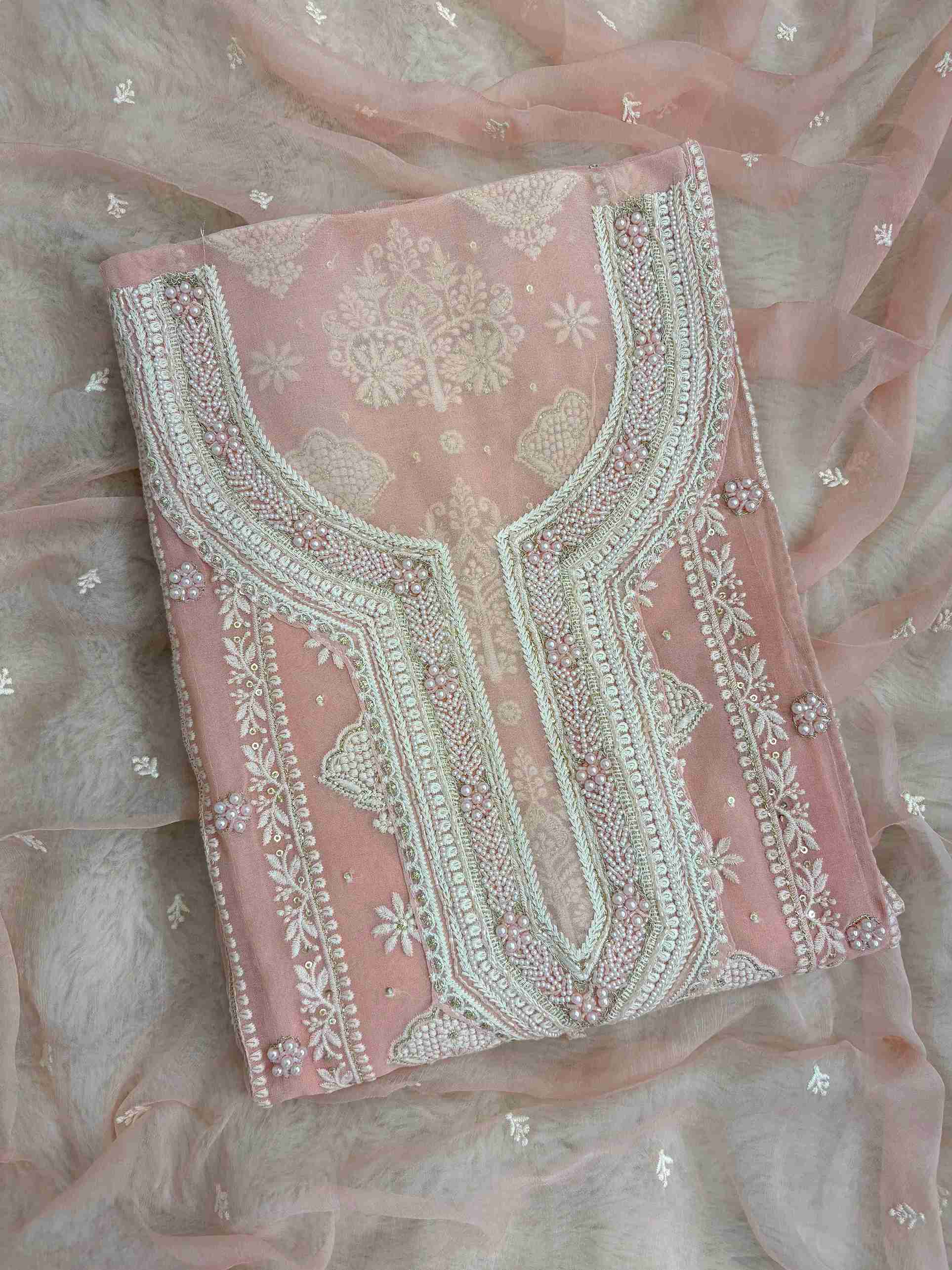 Baby Pink georgette chikankari suit with moti and bead embellished neckline