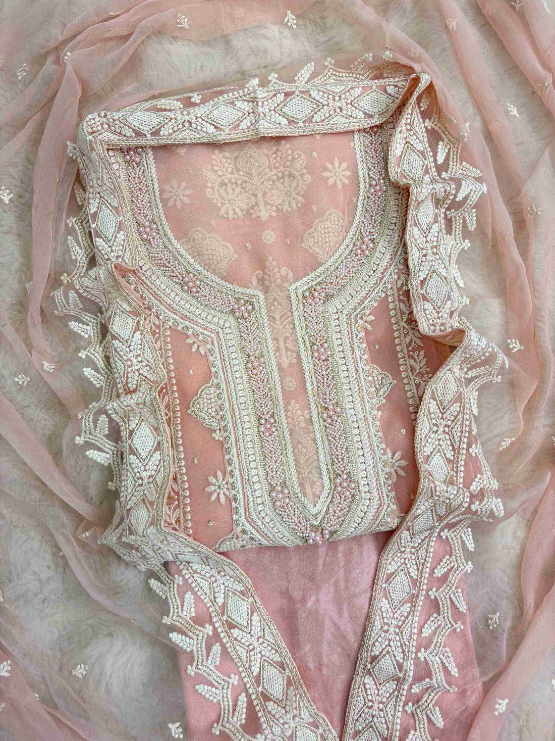 baby pink heavy chikankari wedding wear unstitched suit set front view