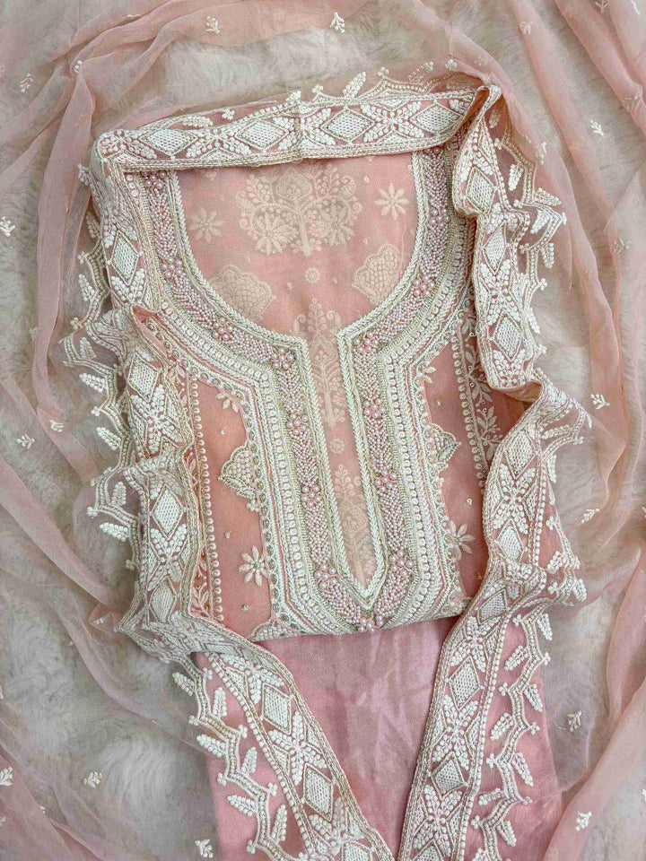 baby pink heavy chikankari wedding wear unstitched suit set front view