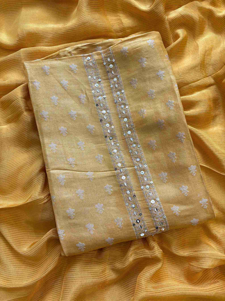 Shimmer Tissue unstitched suit in Yellow color- The Zareesh