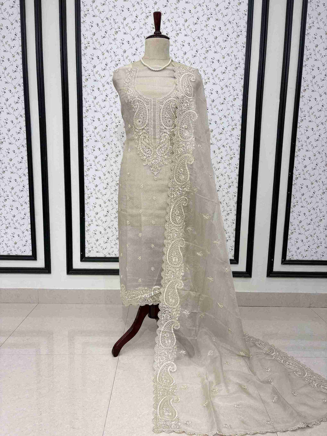 Beige marble chiffon unstitched suit full front view with paisley cutwork dupatta draped on mannequin