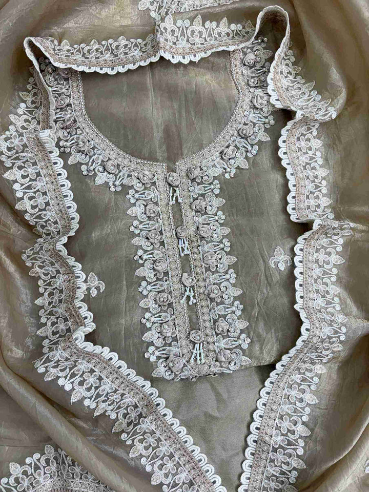 Beige tissue suit with pearl work and 3D floral hand embroidery