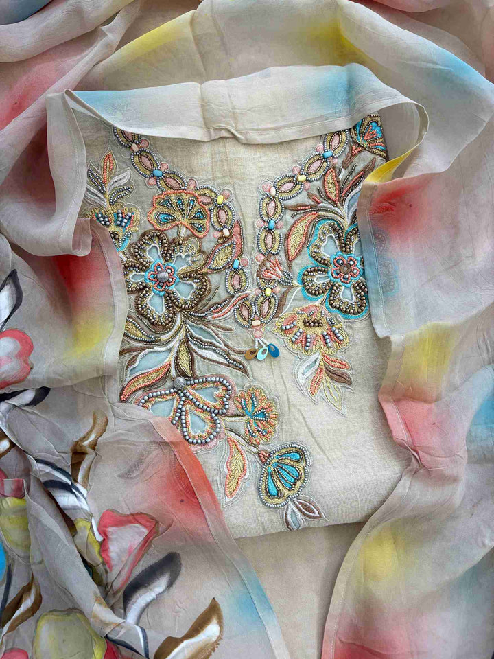 Beige tissue silk unstitched suit with handpainted floral neckline and beadwork