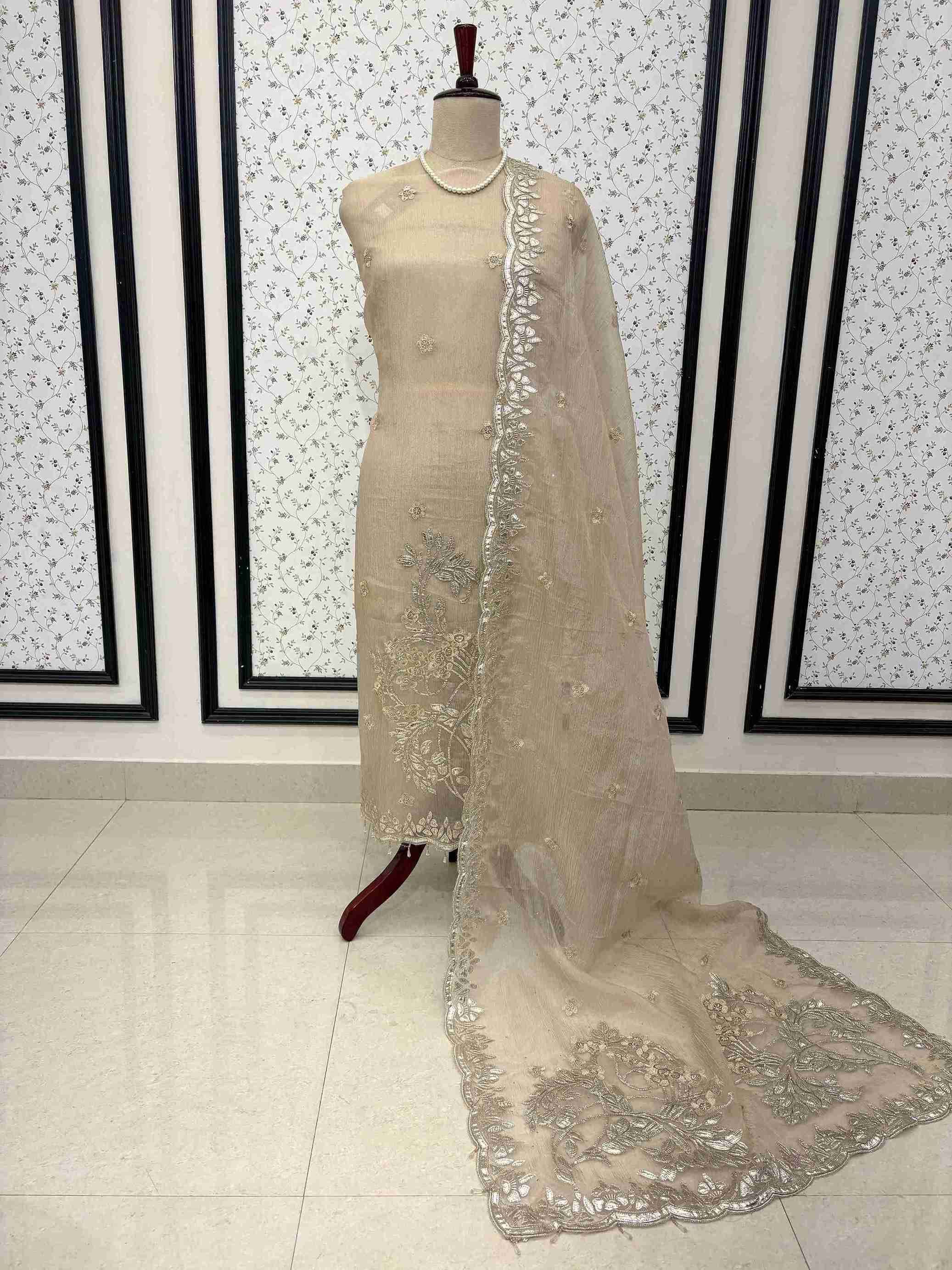 Matching beige tusser crepe bottom fabric