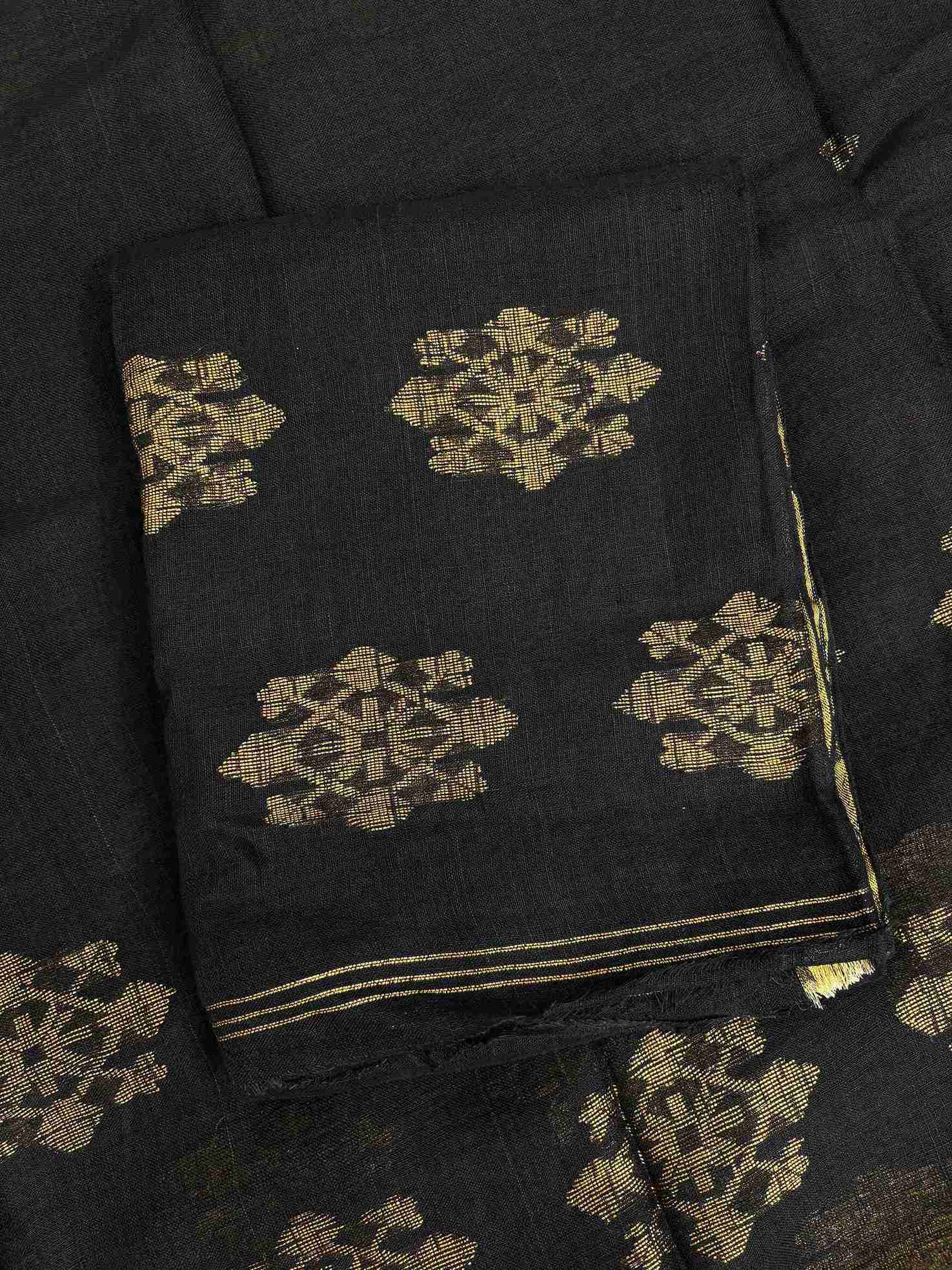 Natural slub texture and organic weave of black pure handloom linen shirt fabric close-up