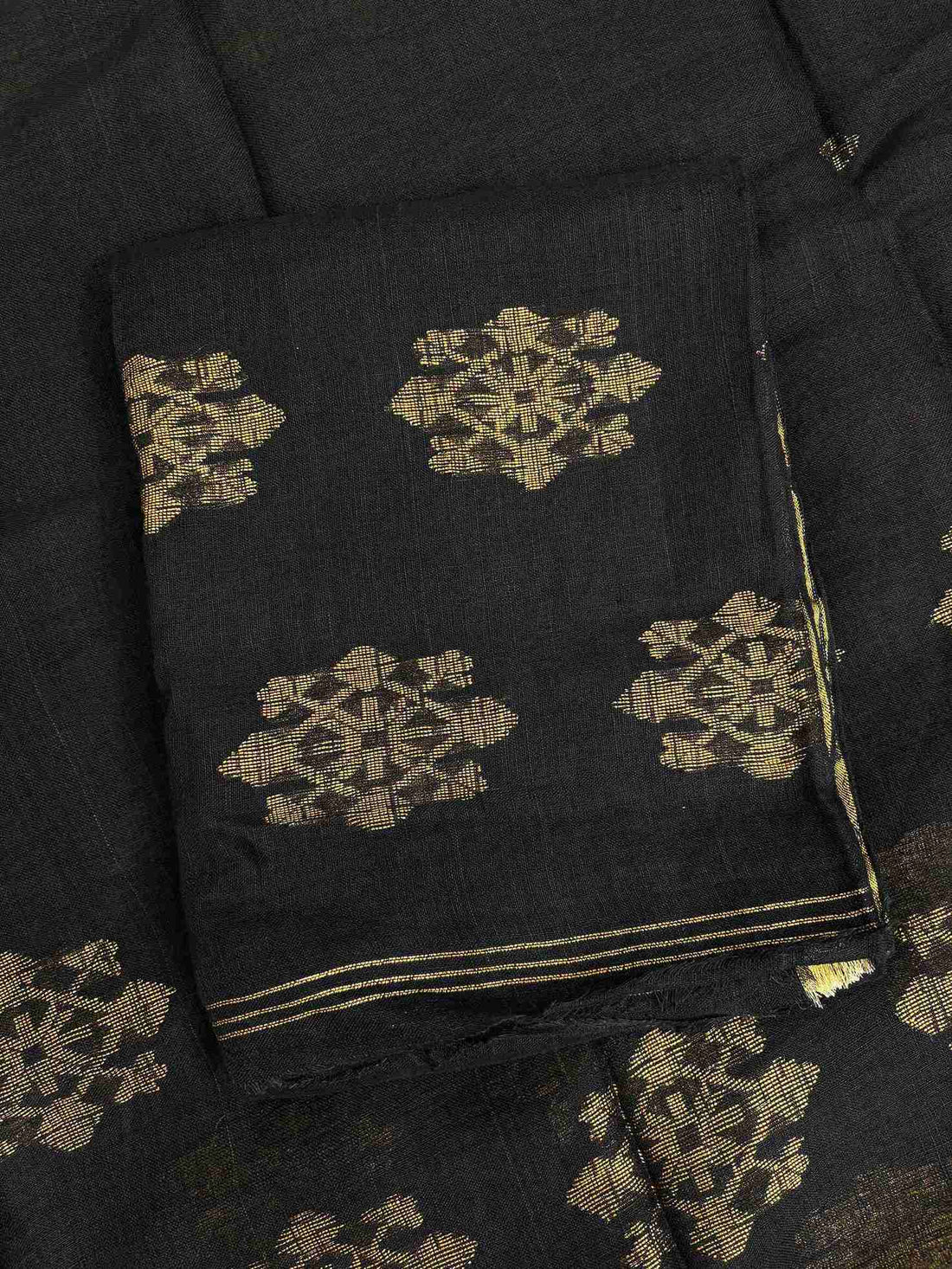 Natural slub texture and organic weave of black pure handloom linen shirt fabric close-up