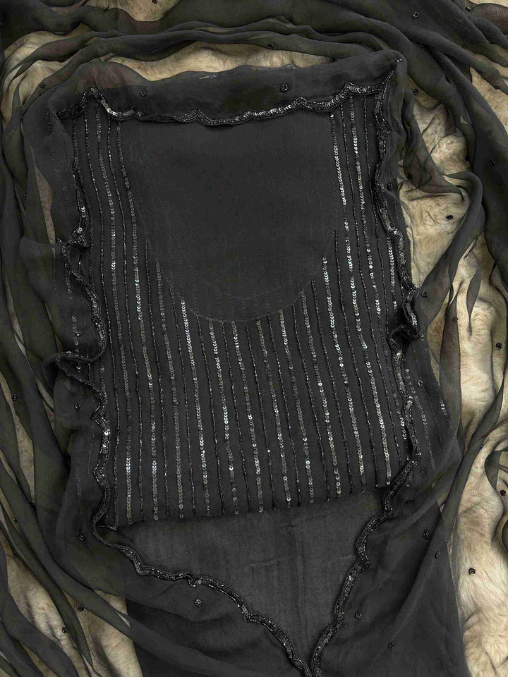 Black georgette unstitched suit set with heavy sequin and bead handwork
