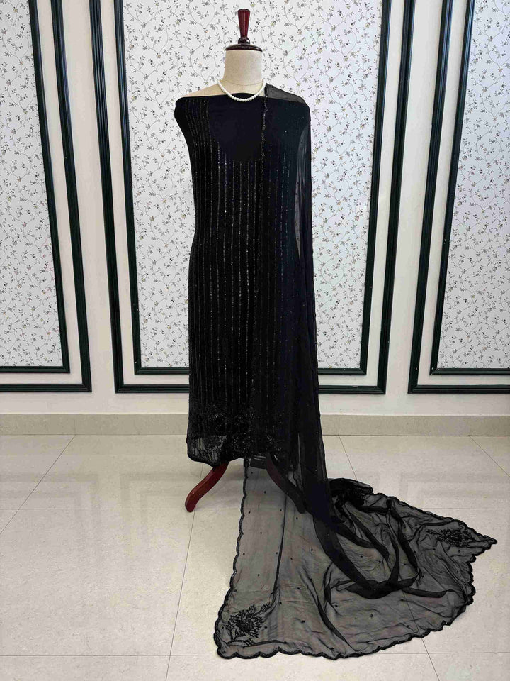 Black georgette unstitched suit set on manequinn