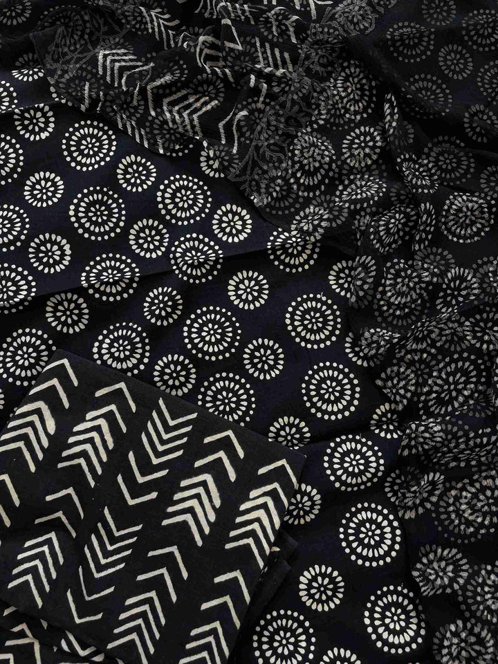 Black hand block printed cotton unstitched suit set with chiffon dupatta