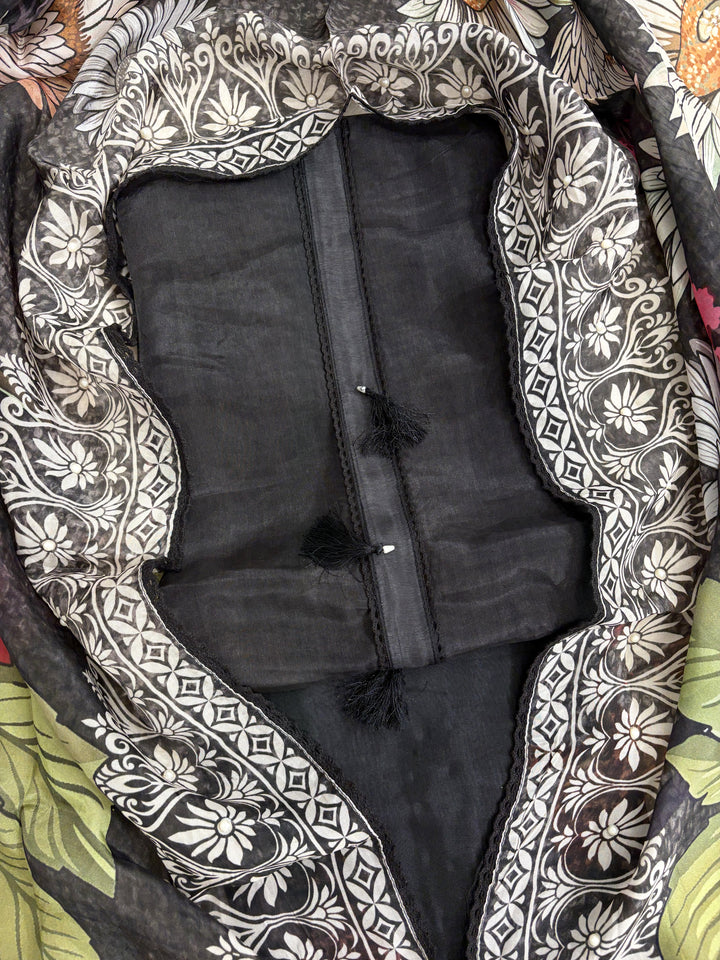 Black silk organza shirt base fabric close-up showing lustrous semi-sheer texture