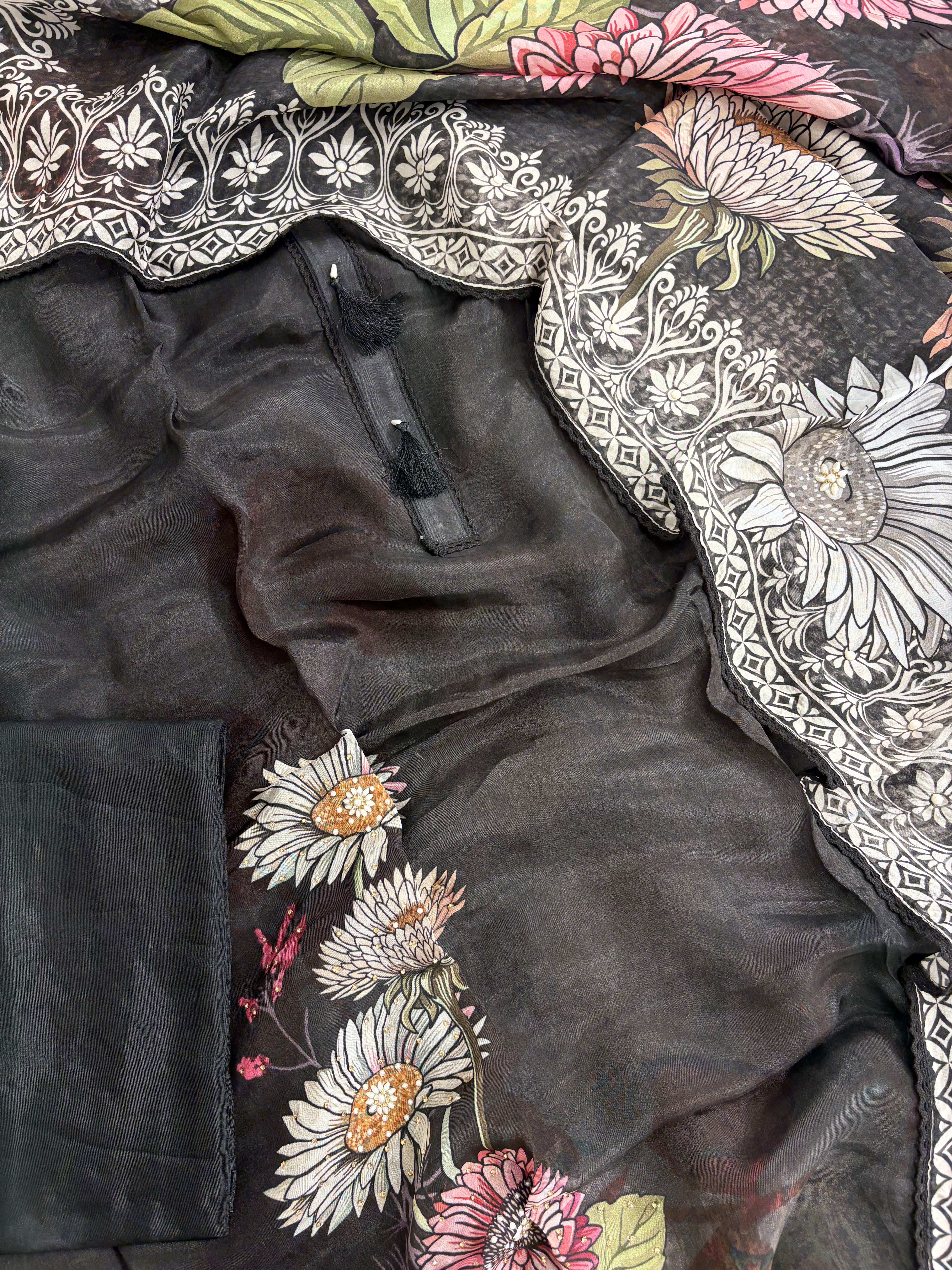 Complete black silk organza unstitched suit flat lay set with shirt, dupatta, and black opada silk bottom