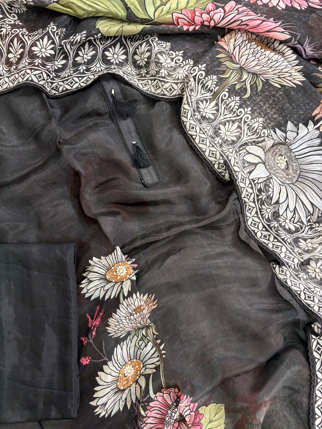 Complete black silk organza unstitched suit flat lay set with shirt, dupatta, and black opada silk bottom