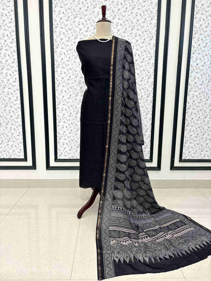 Full unstitched black Maheshwari silk suit set with Ajrakh dupatta and cotton bottom