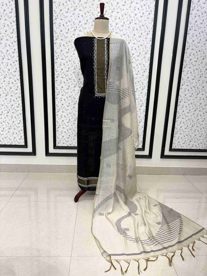Black viscose unstitched suit set displayed on mannequin with mirror highlight neckline and dupatta