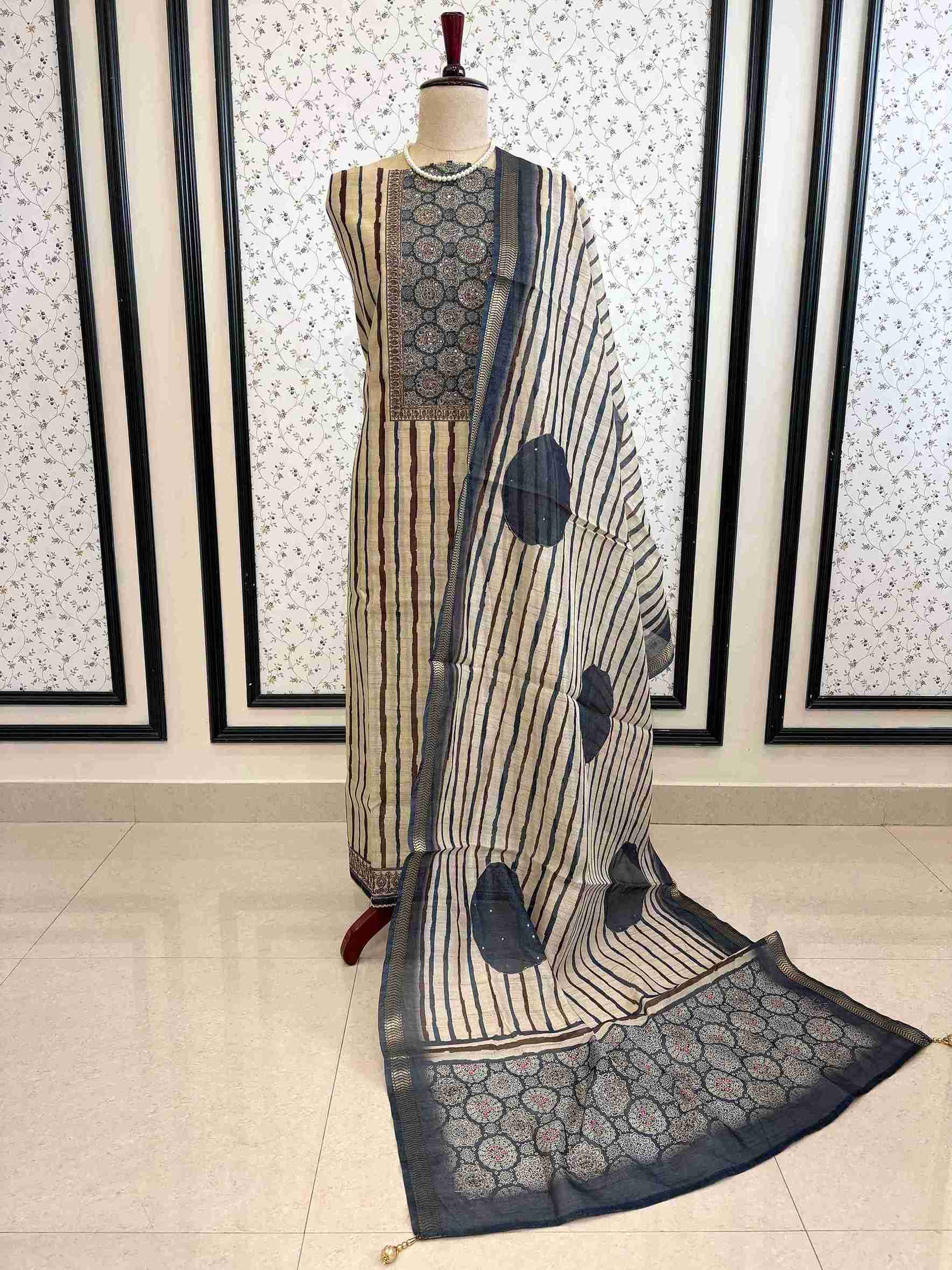 Complete Chanderi unstitched suit set with Ajrakh neckline and dupatta on manequinn
