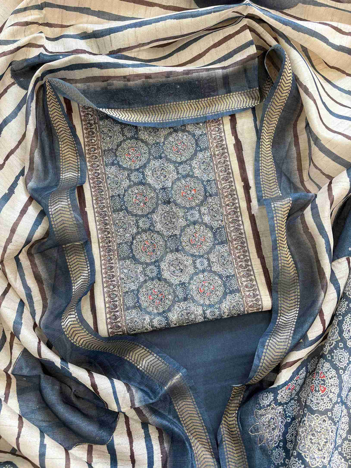 Blue Chanderi unstitched suit with Ajrakh printed neckline and solid kurta design