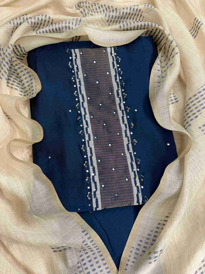 Close view of blueviscose shirt featuring mirror highlight detailing on neckline