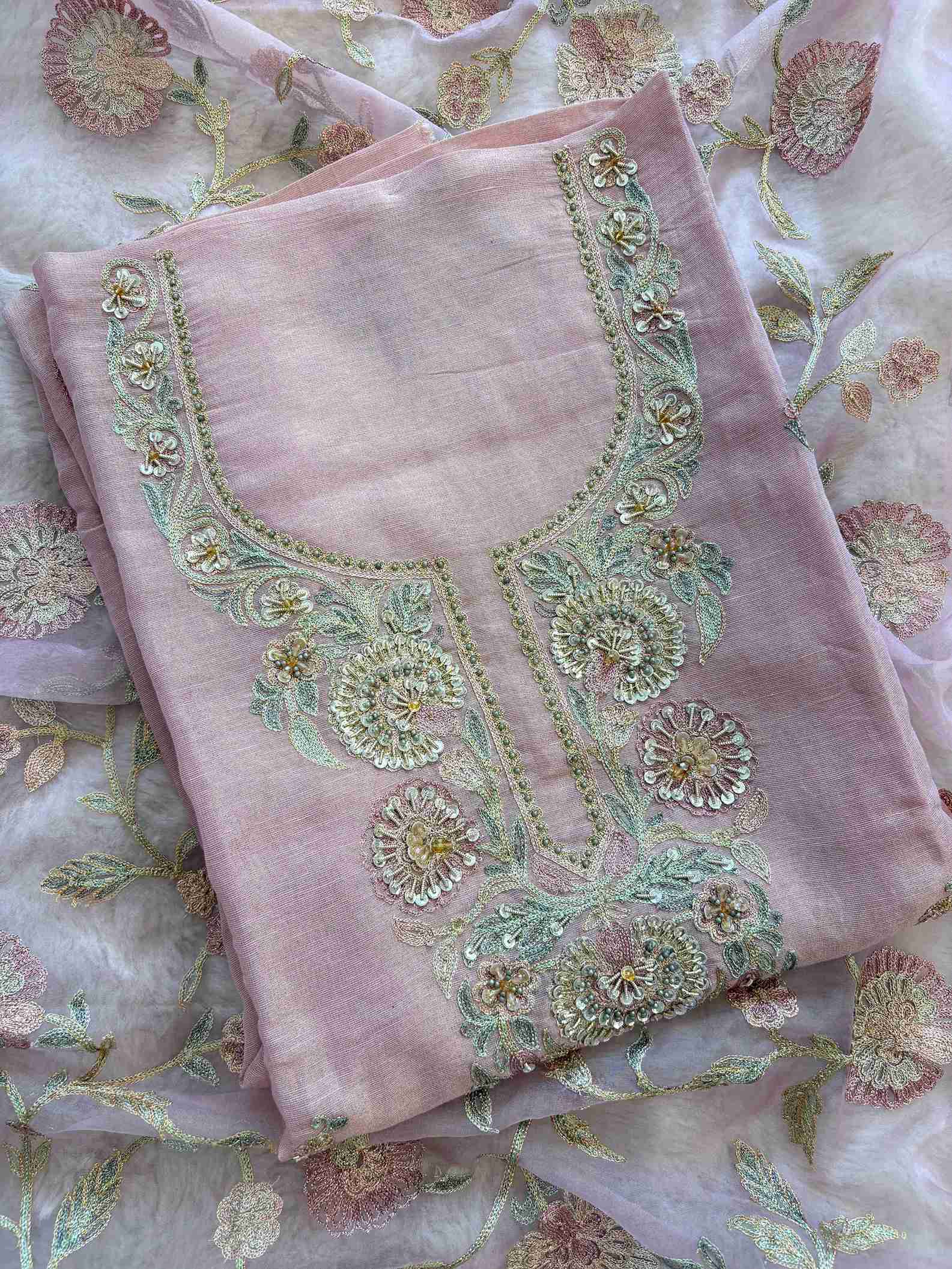 Close-up of multicolor resham and zari embroidered neckline with sequins