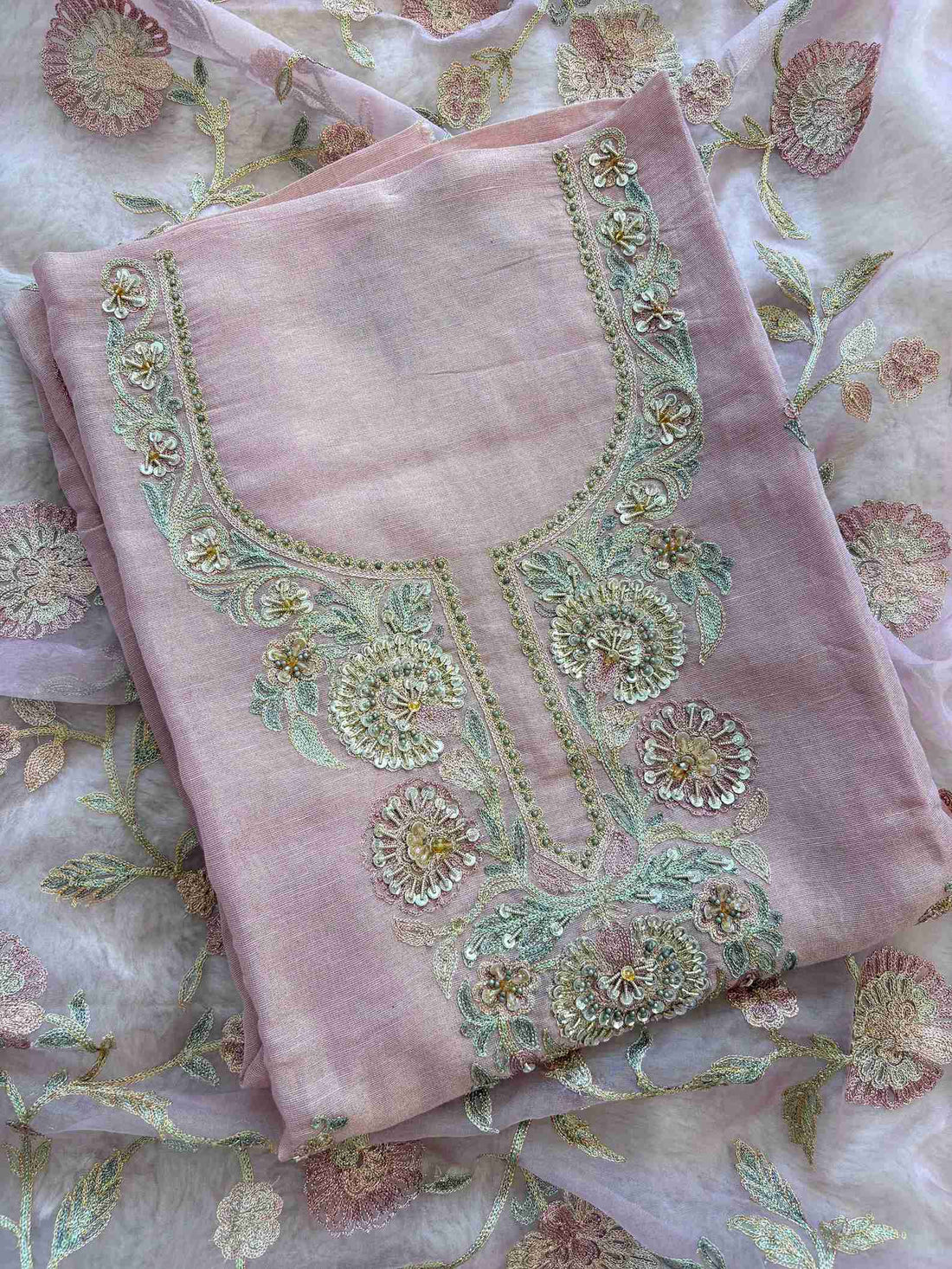 Close-up of multicolor resham and zari embroidered neckline with sequins