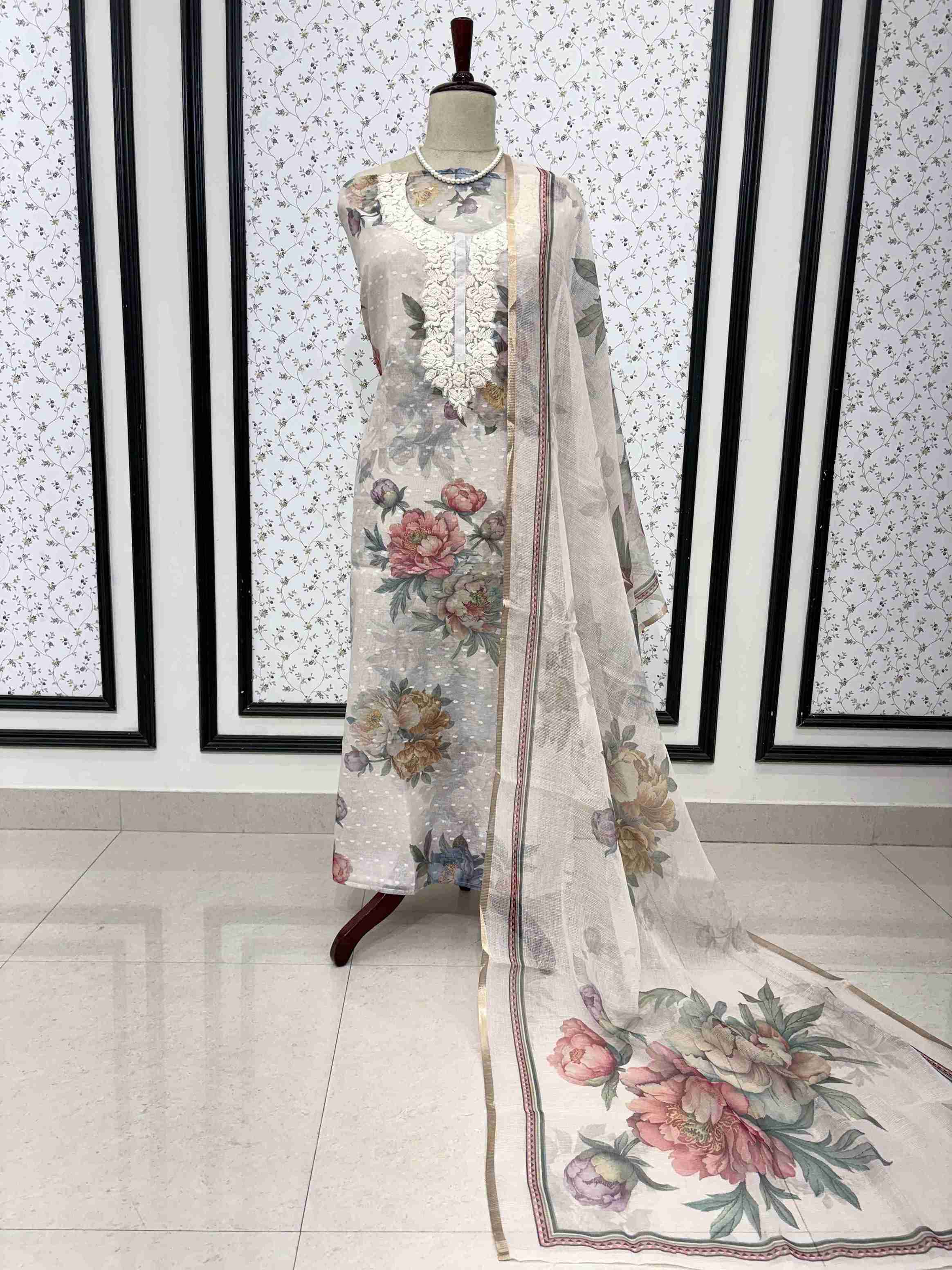 Blush white linen unstitched suit full front view with kota doriya digital floral print dupatta draped on mannequin
