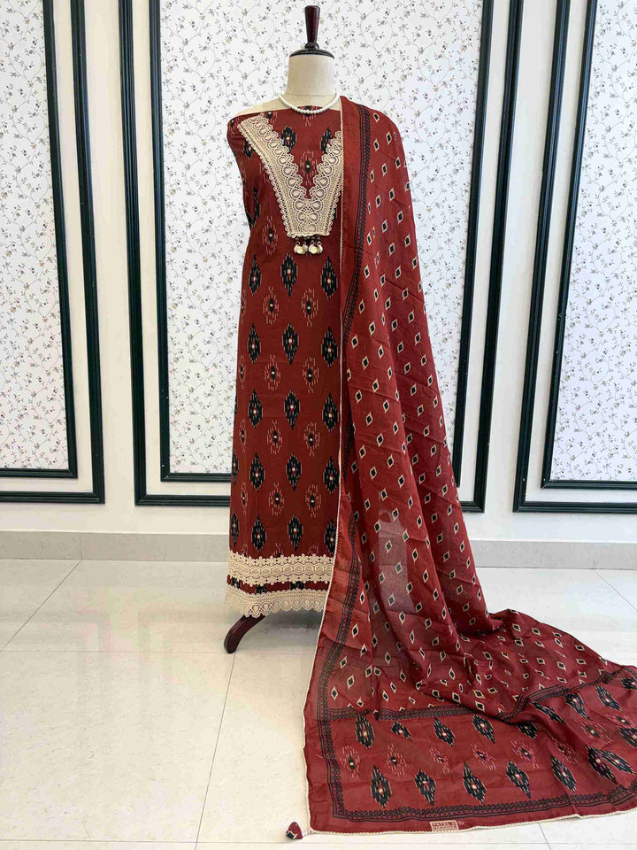 Brick red cotton unstitched suit full front view with matching ikat diamond print dupatta draped on mannequin
