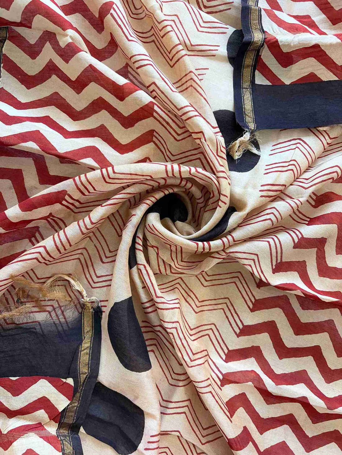 Brick red and beige Maheshwari silk dupatta with geometric chevron hand block print and black dots