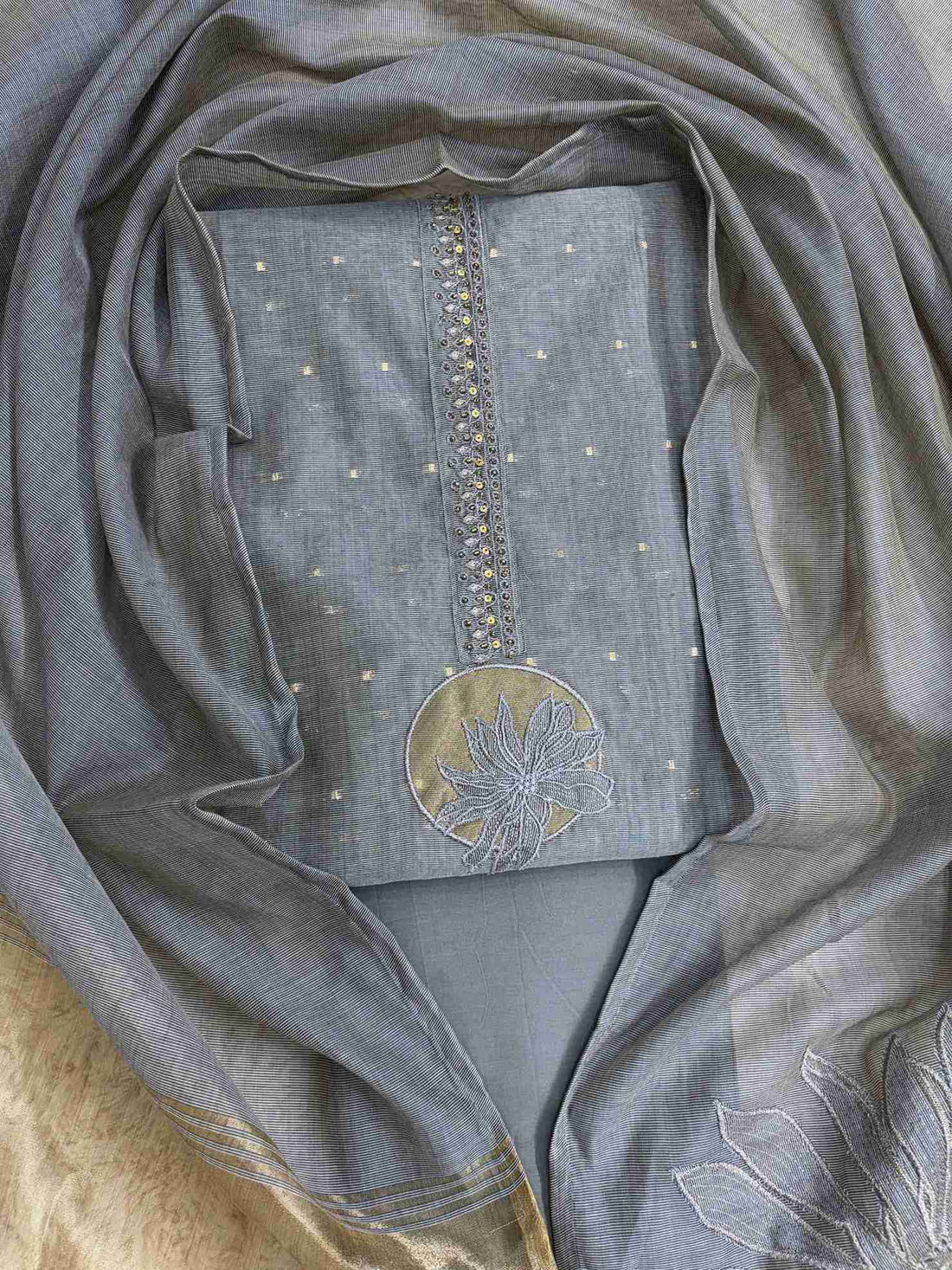 Grey Jamdani Cotton Unstitched Suit | Minimalist Applique Floral Neckline | Broad Gold Zari Patta Hemline & Applique Corner Dupatta Women's Suit