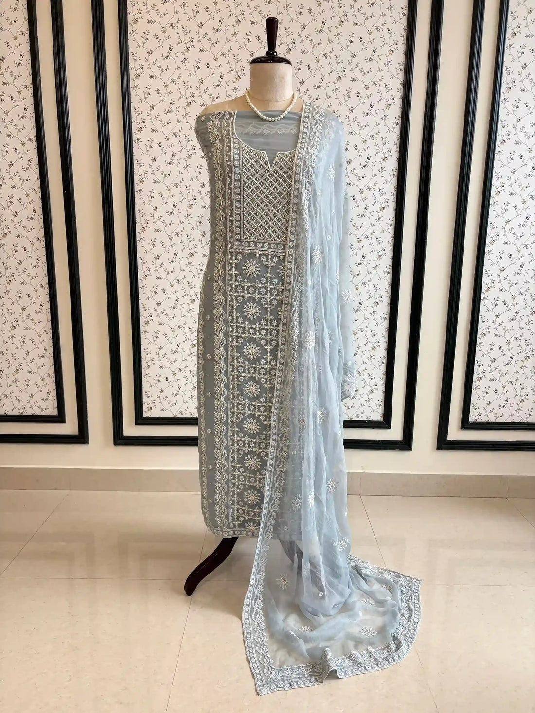 Powder blue georgette suit with moti highlighting and chiffon dupatta – embroidered festive ethnic wear for weddings and formal occasions.