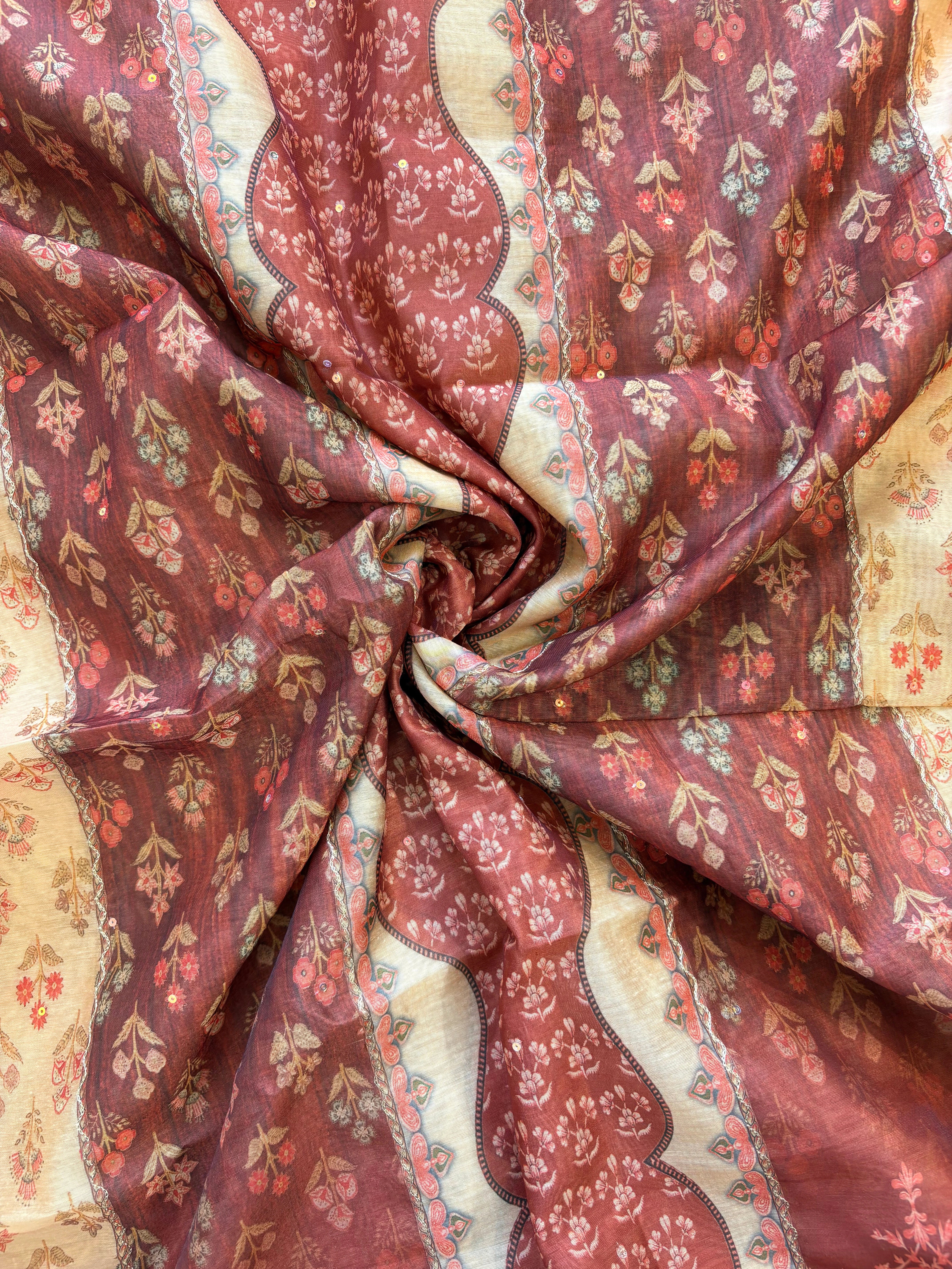 Rust red chanderi suit with golden weave and printed chanderi dupatta featuring tassel edging.