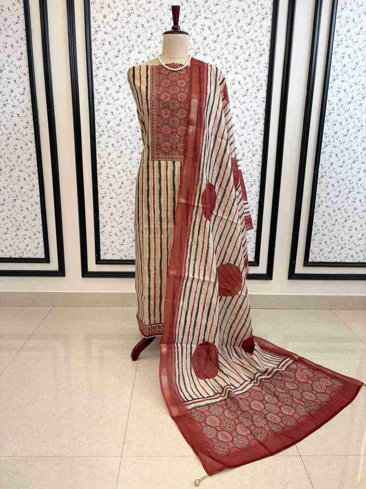 Complete Chanderi unstitched suit set with Ajrakh neckline and dupatta on manequinn