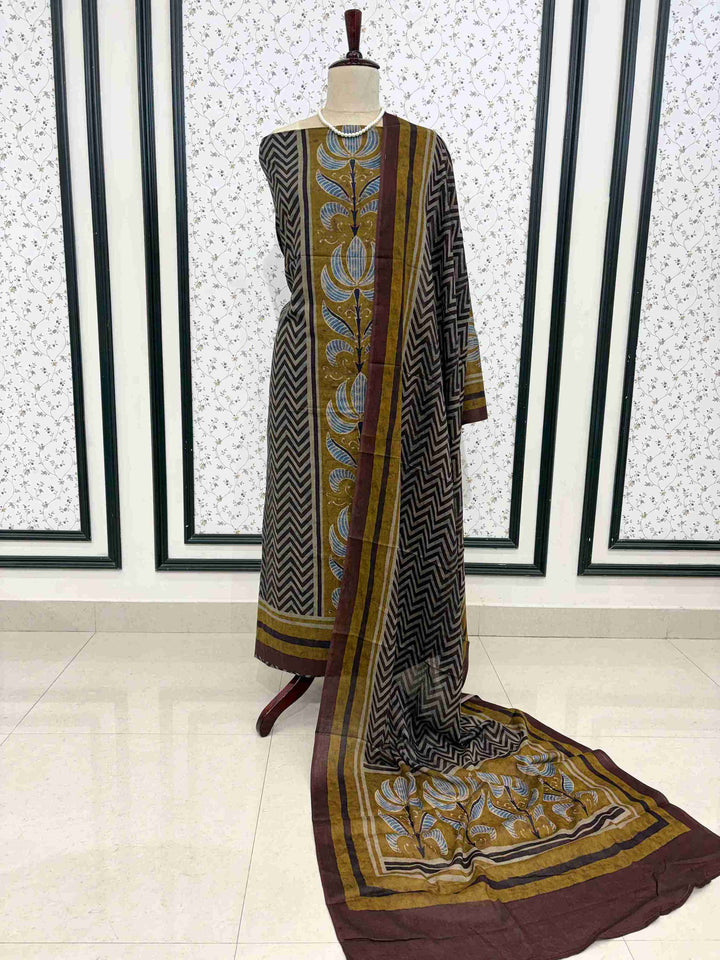 Charcoal grey mul cotton unstitched suit full front view with zigzag and floral motif dupatta draped on mannequin
