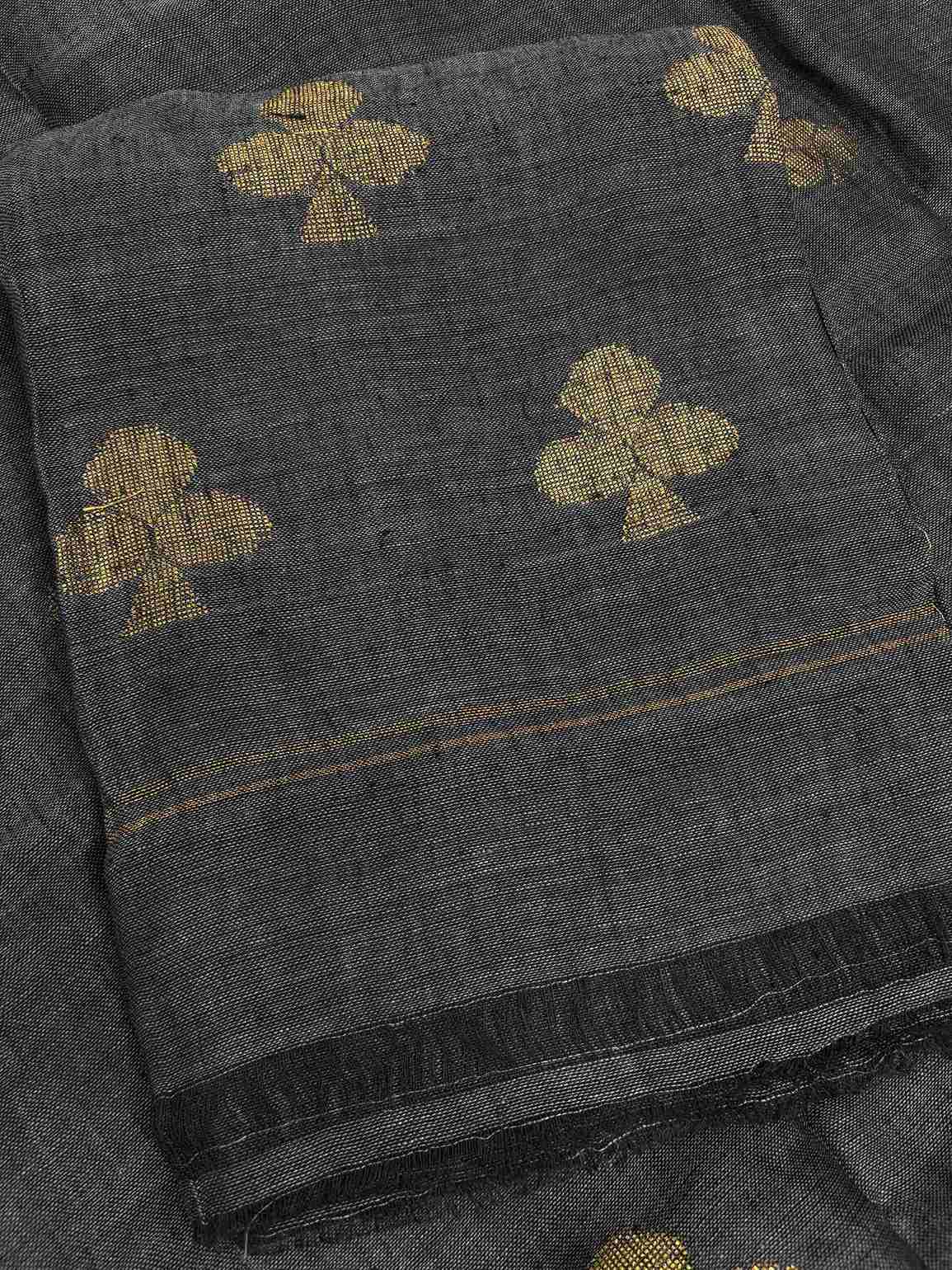 Natural slub texture and organic weave of charcoal grey pure handloom linen shirt fabric close-up