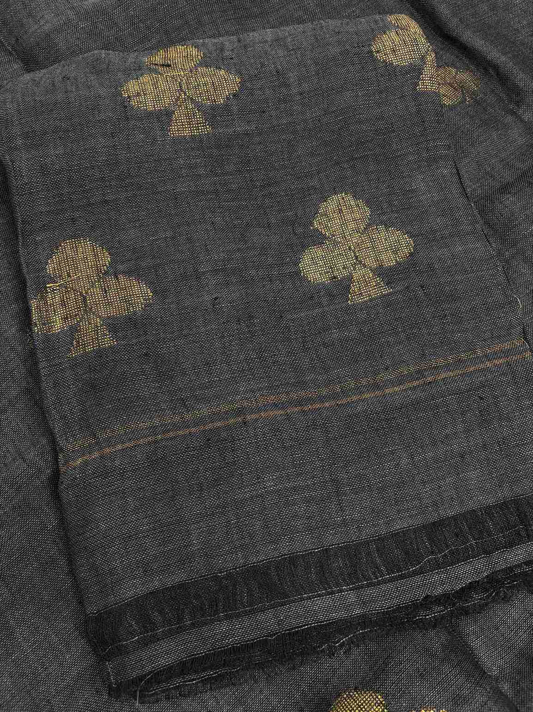 Natural slub texture and organic weave of charcoal grey pure handloom linen shirt fabric close-up