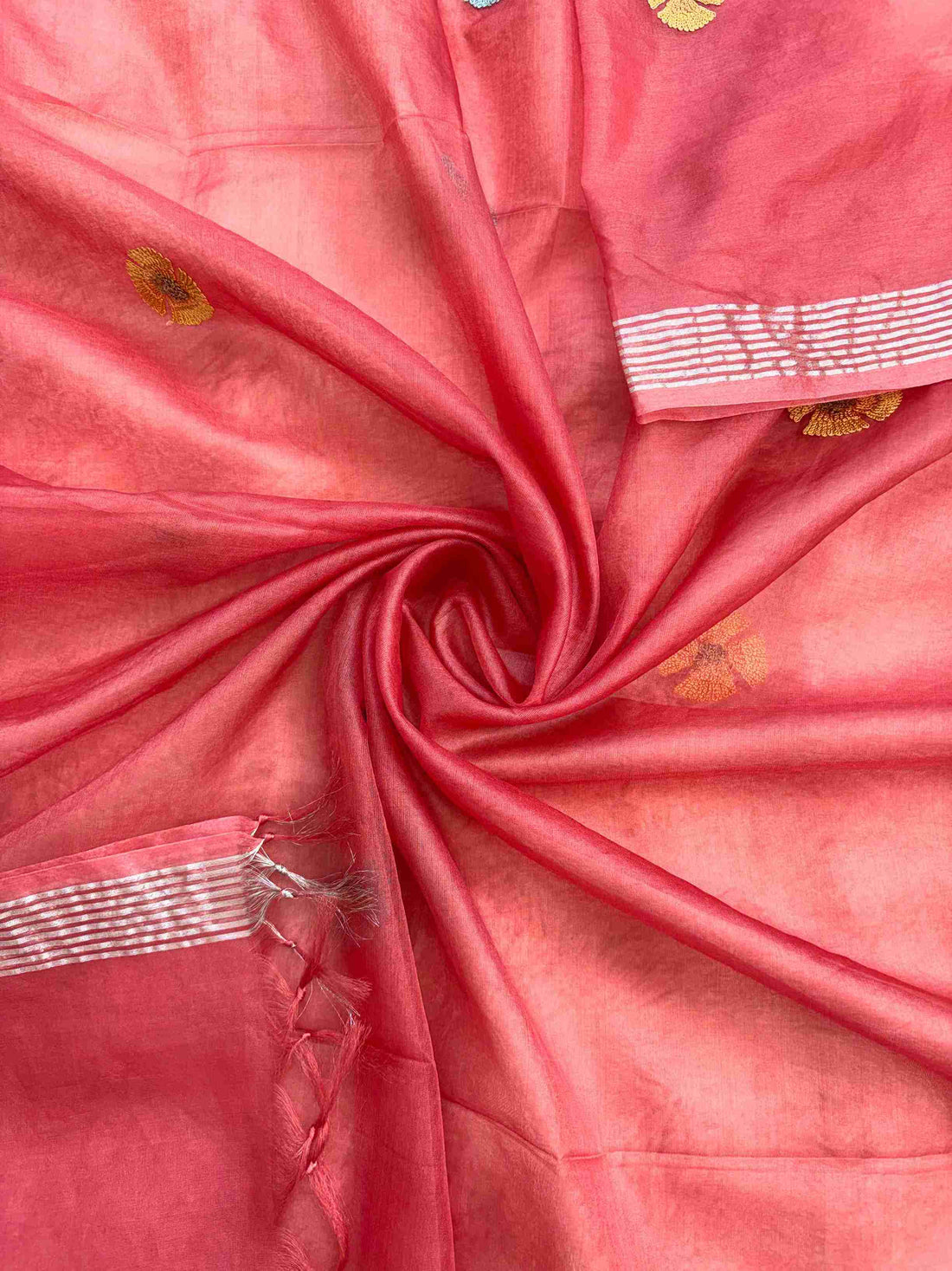 Coral pink organza dupatta with embroidered florals and silver striped border