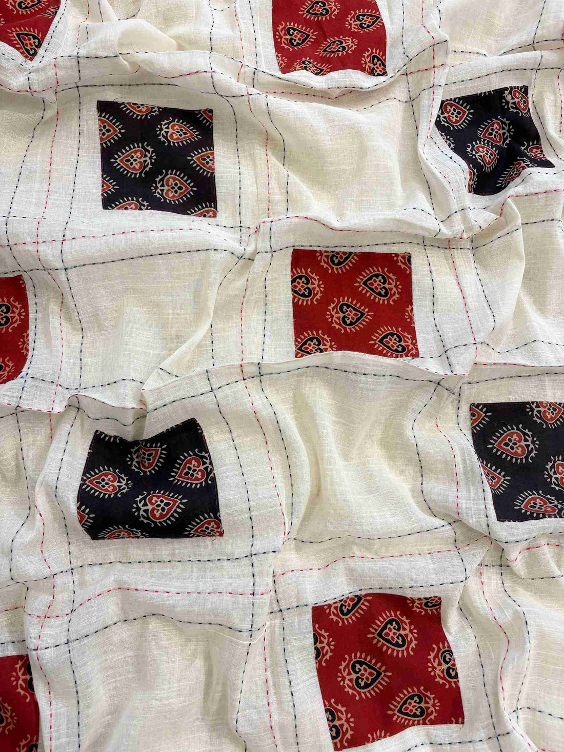 Cotton dupatta featuring applique patches with woven detailing and border