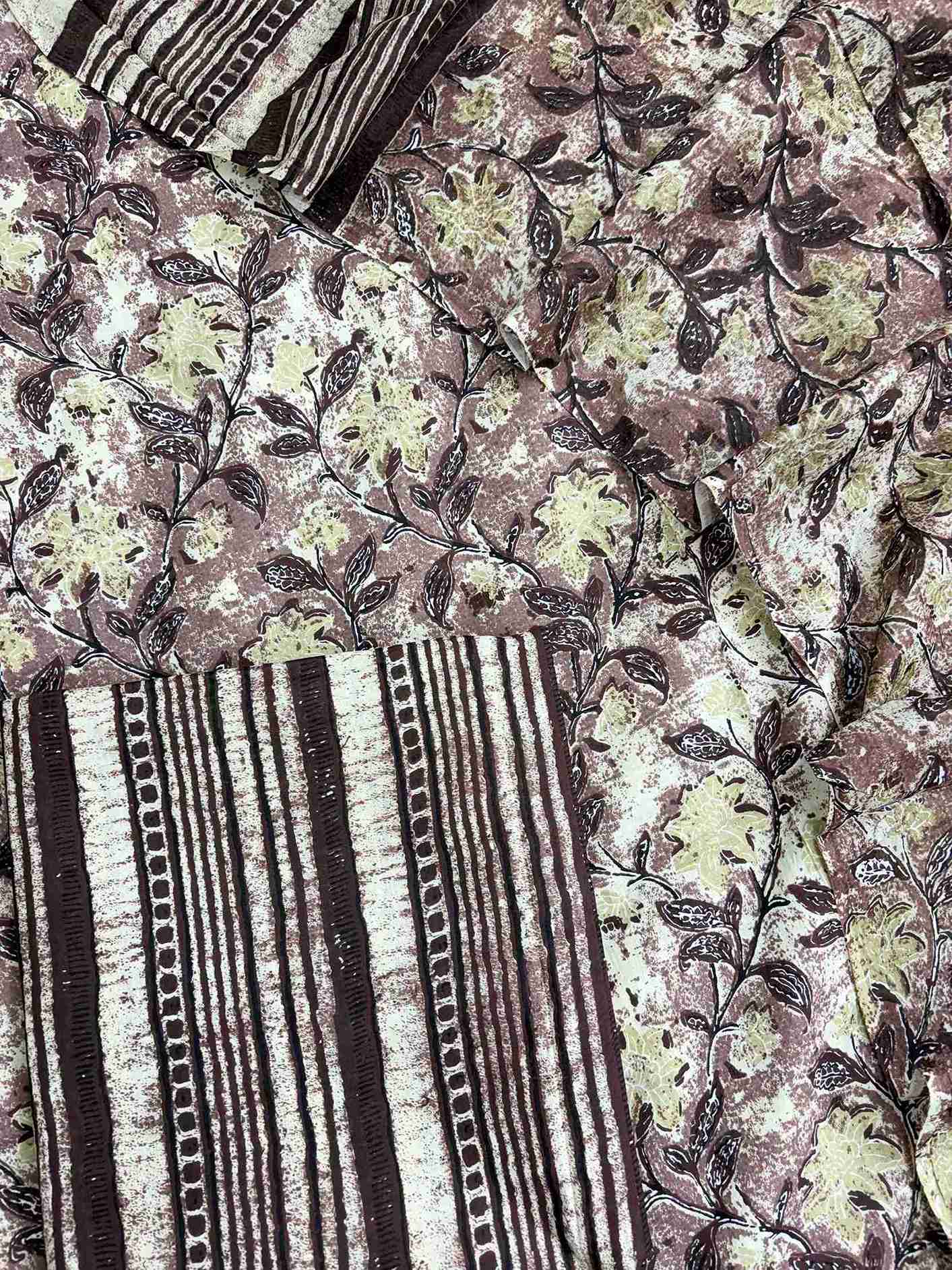 Close up of floral digital jaal print on pure cotton fabric