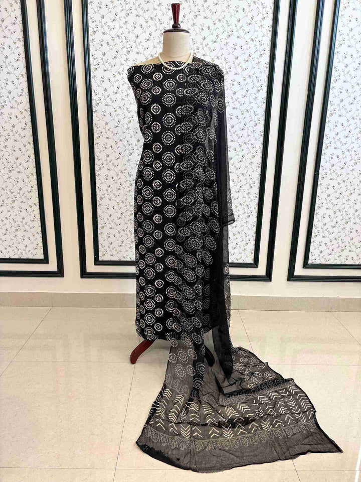 Detailed view of hand block printed cotton fabric for unstitched suit