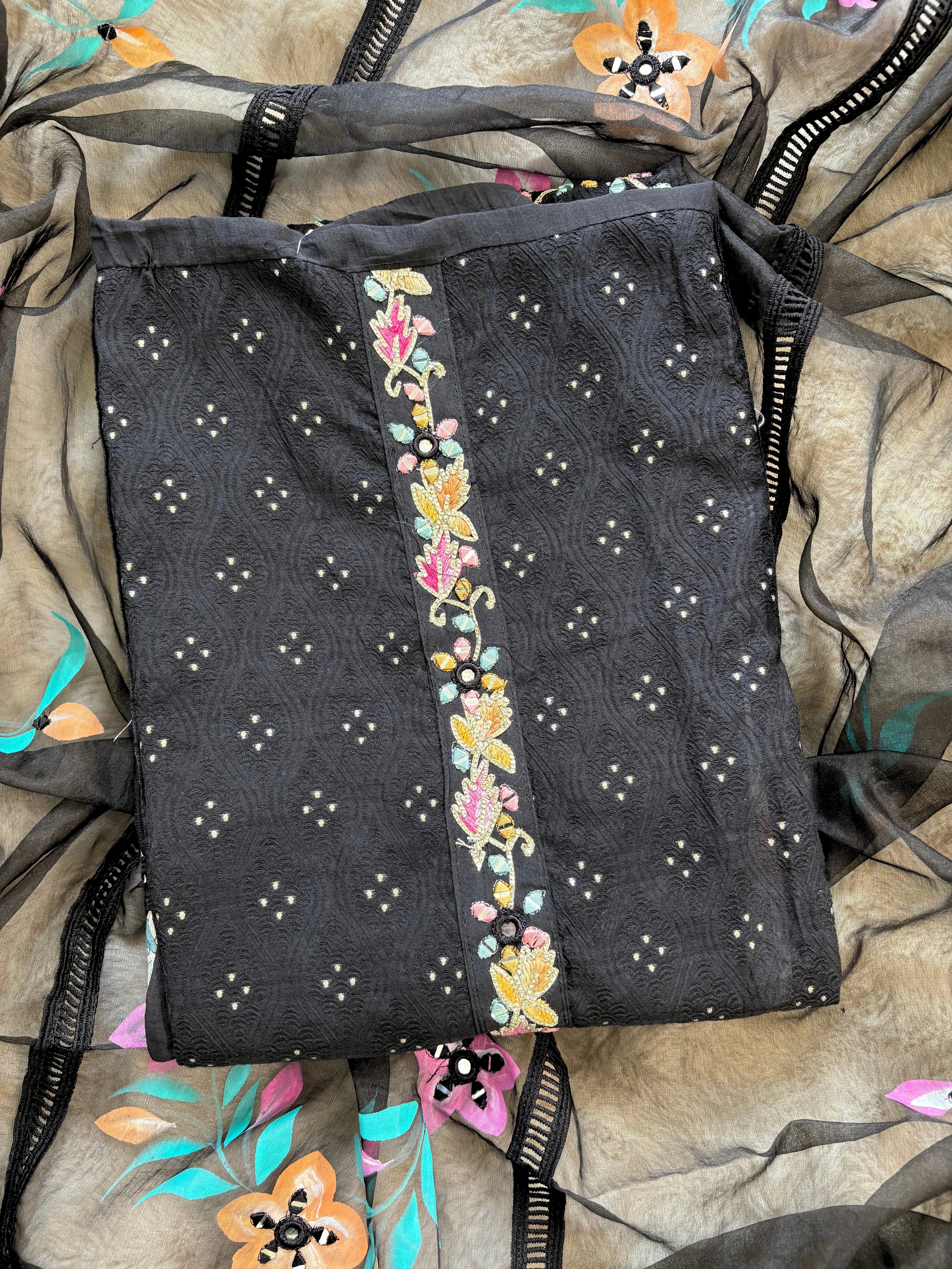 black linen suit with embroidered detailing and hand-painted floral organza dupatta, finished with lace border – unstitched ethnic wear set
