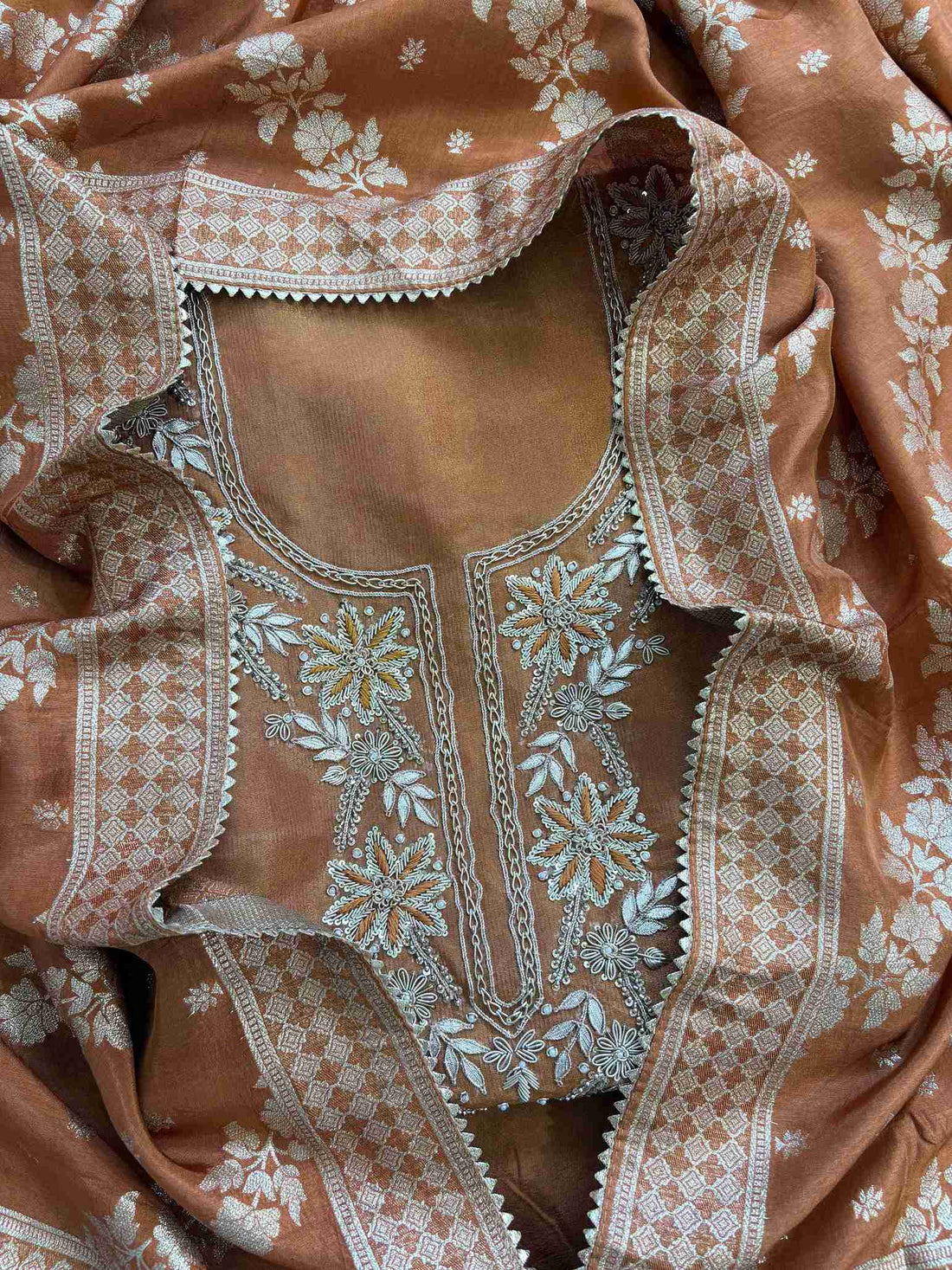 satin organza orange unstitched suit with zardozi neckline