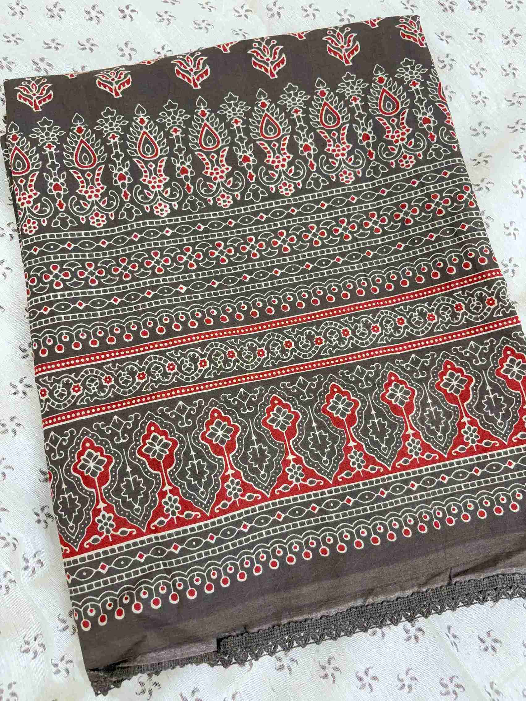 All-over ajrak block print booties in red and cream tones across dark brown pure cotton shirt daaman