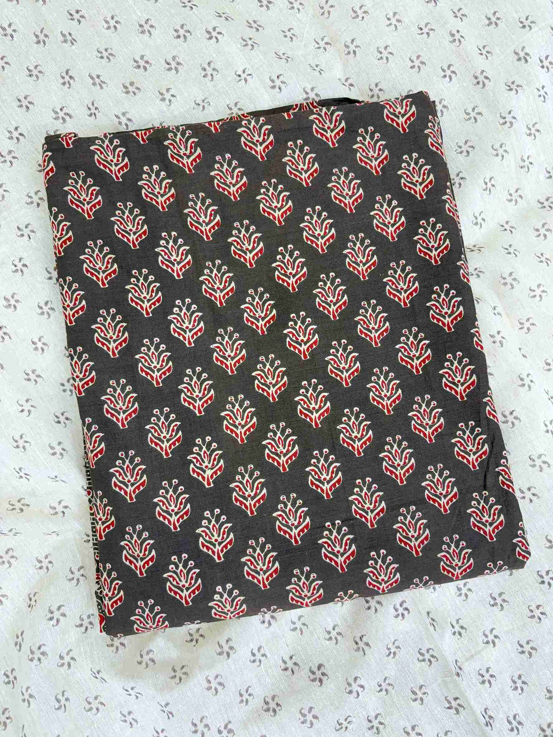 All-over ajrak block print booties in red and cream tones across dark brown pure cotton shirt body