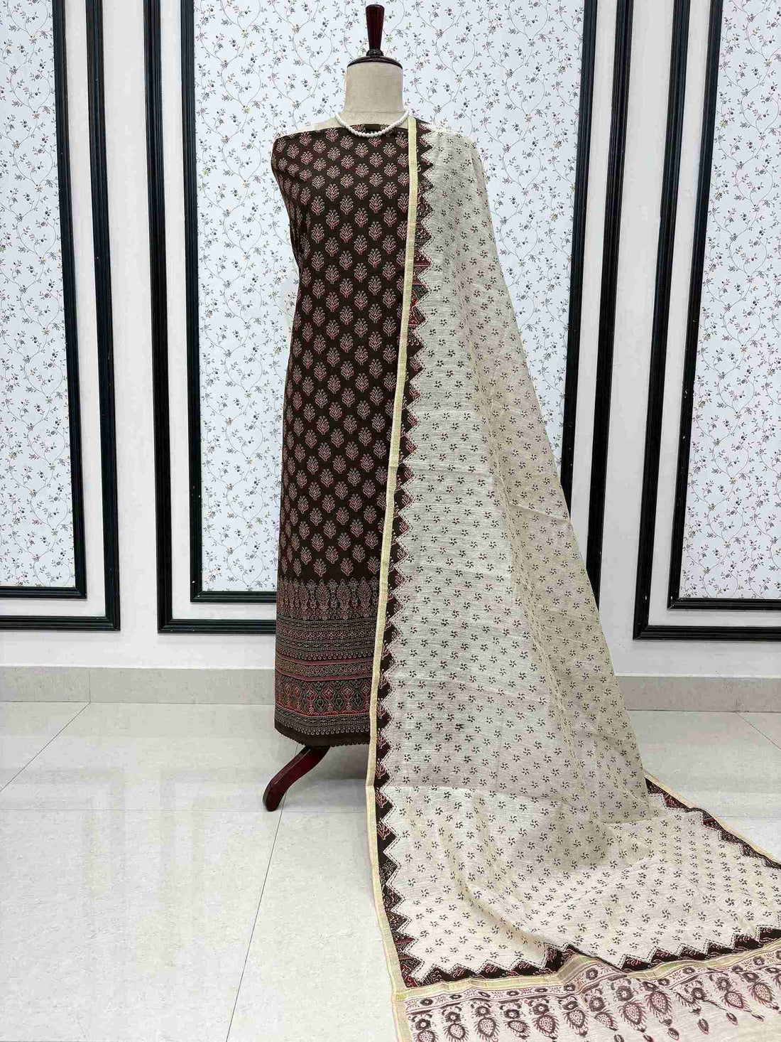 Dark brown pure cotton unstitched suit full front view with off-white khadi ajrak dupatta draped on mannequin