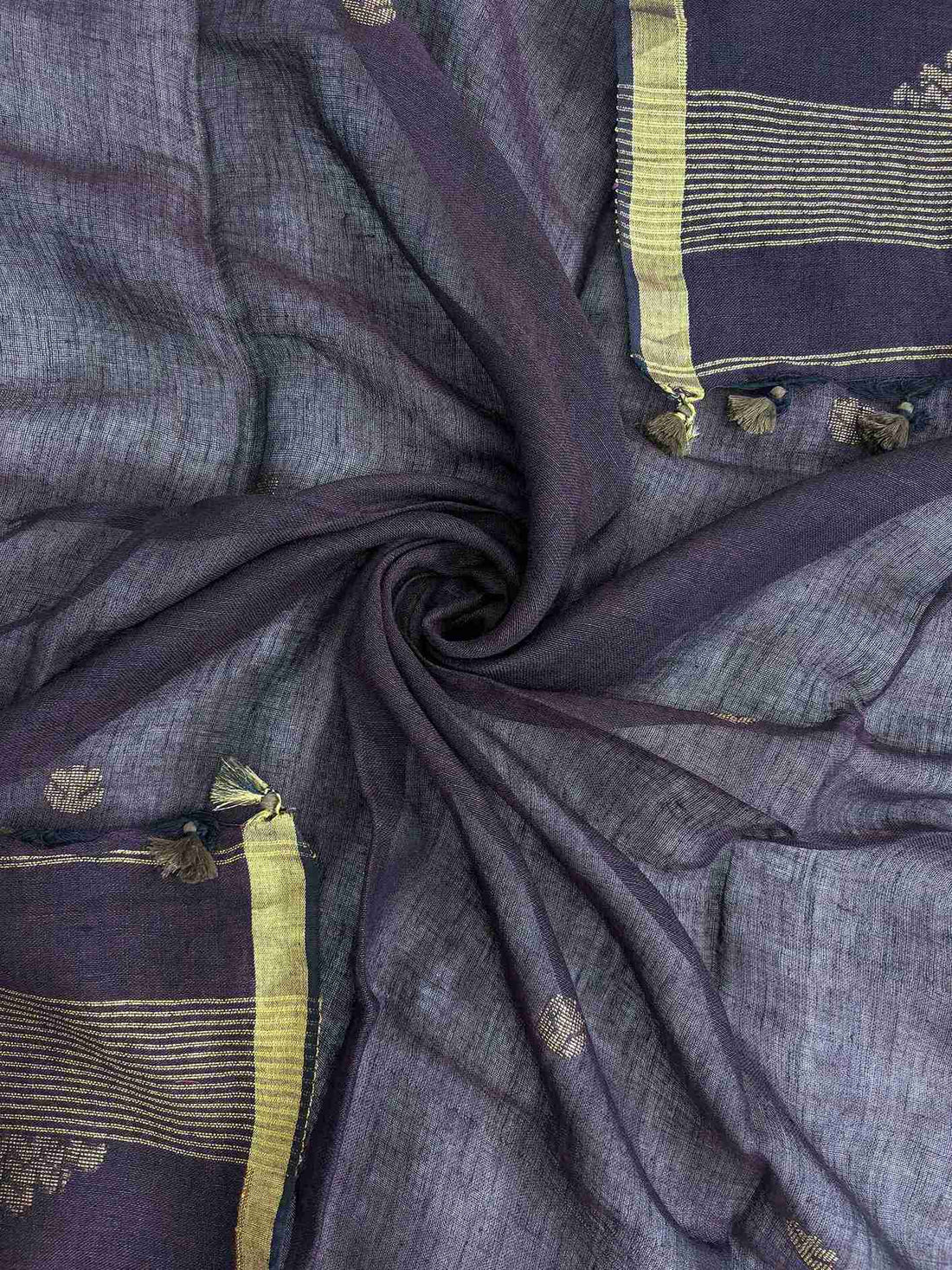 Large multicolor woven floral and bird motifs in green, orange, and red tones across dark purple jaishree linen dupatta surface