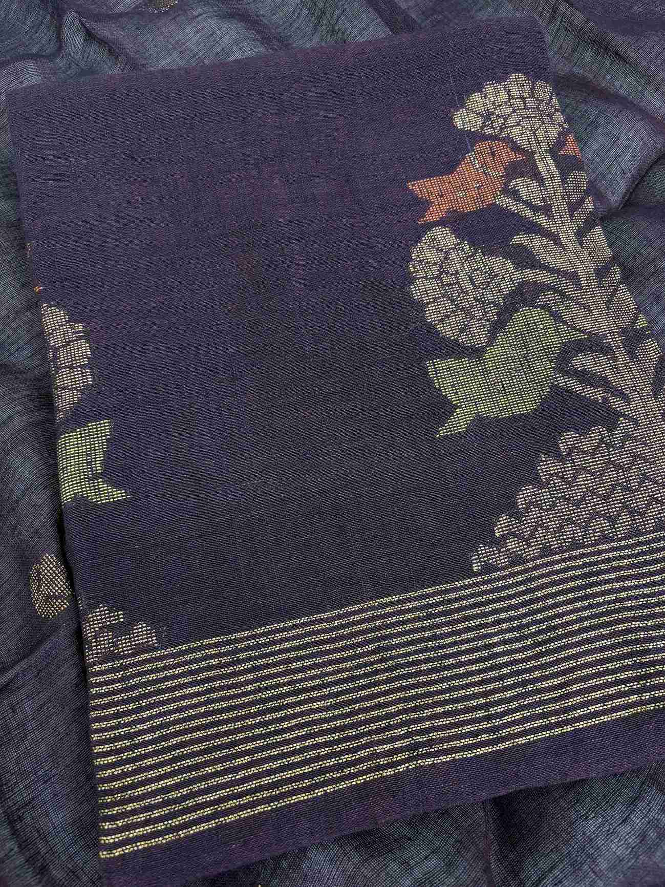 Scattered multicolor woven floral booties in golden tones across dark purple jaishree linen shirt body