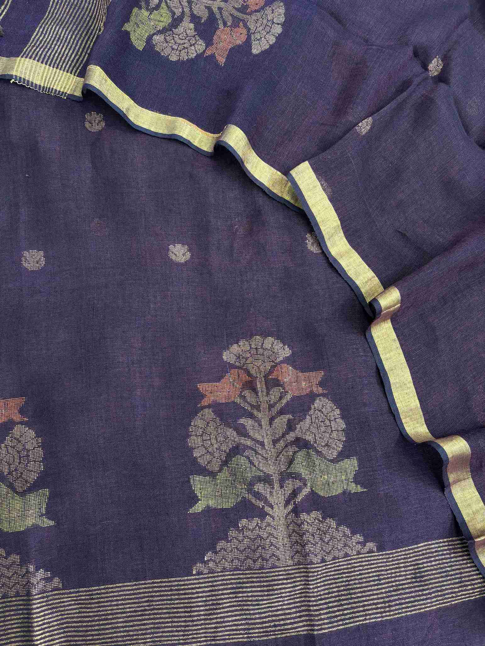 Complete dark purple jaishree linen unstitched suit flat lay with shirt and dupatta showing multicolor woven motifs and gold zari borders