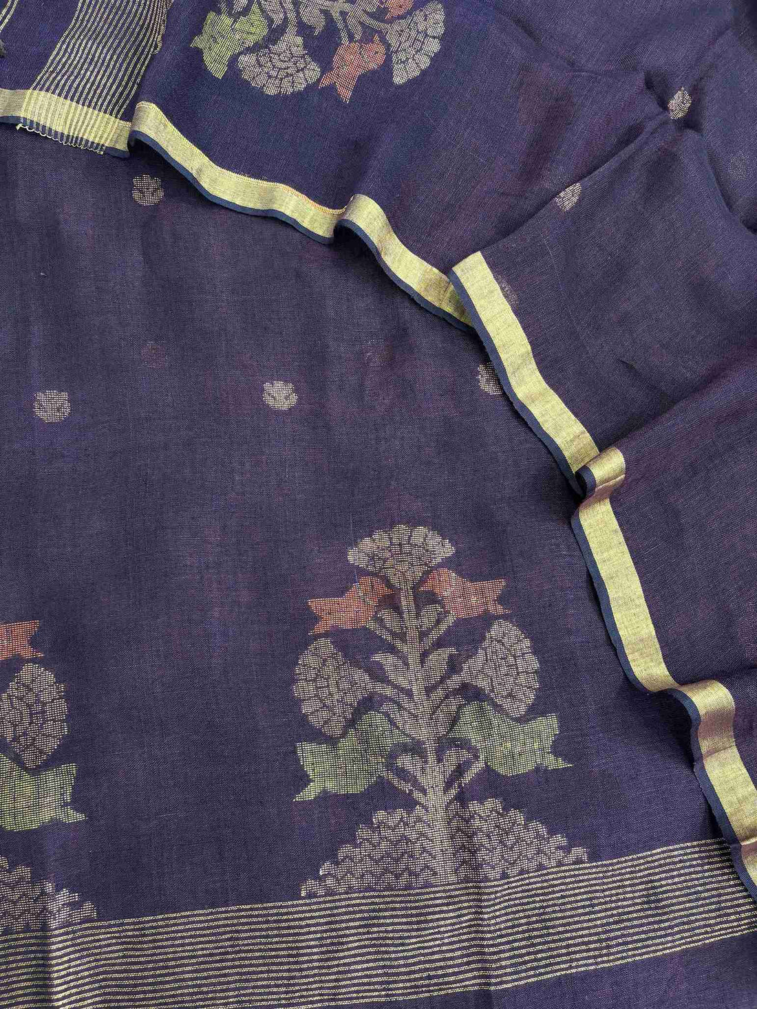 Complete dark purple jaishree linen unstitched suit flat lay with shirt and dupatta showing multicolor woven motifs and gold zari borders