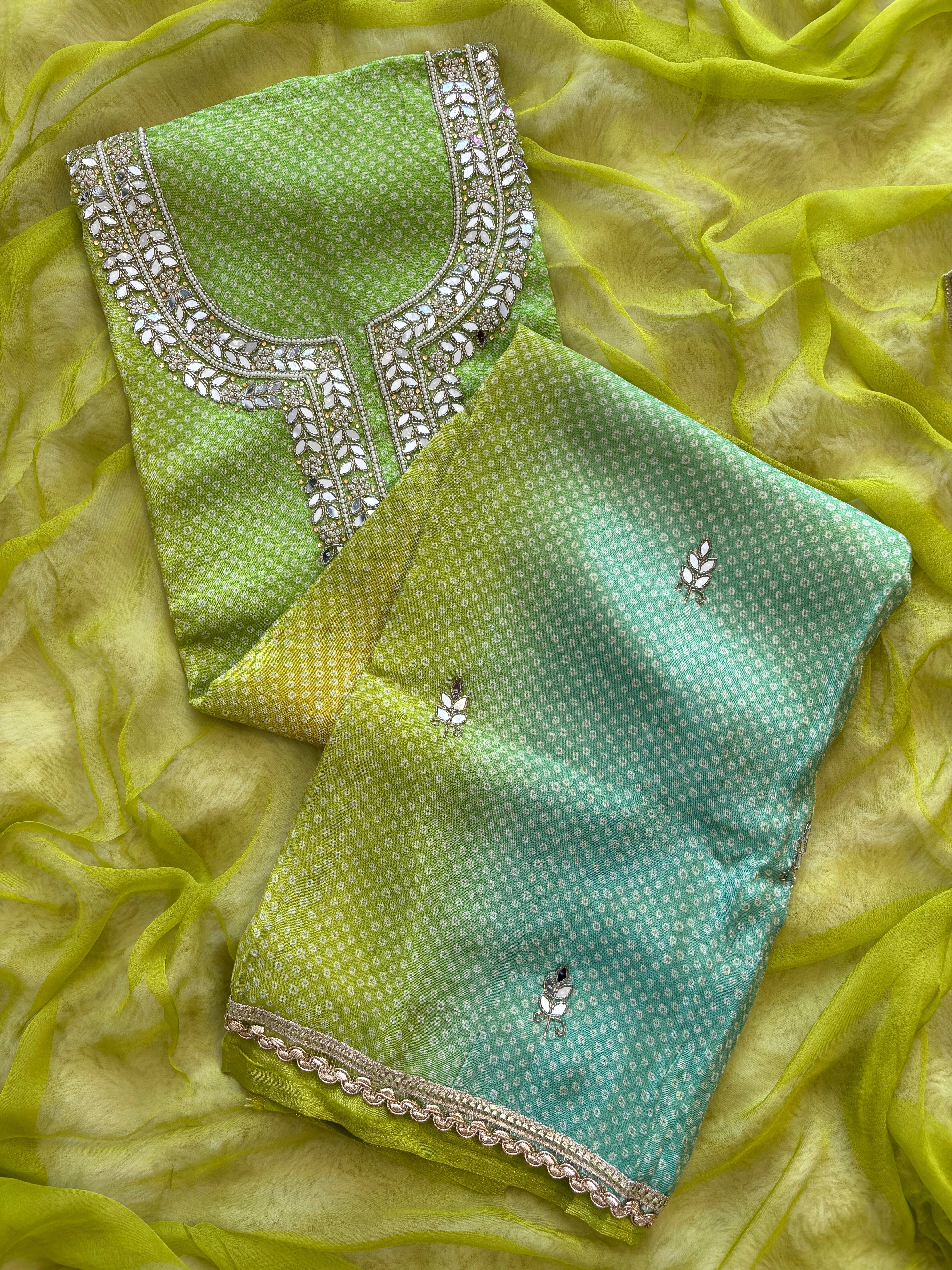 Lime Green Shimmer organza bandhani suit with ombre effect and chiffon dupatta with lace border.