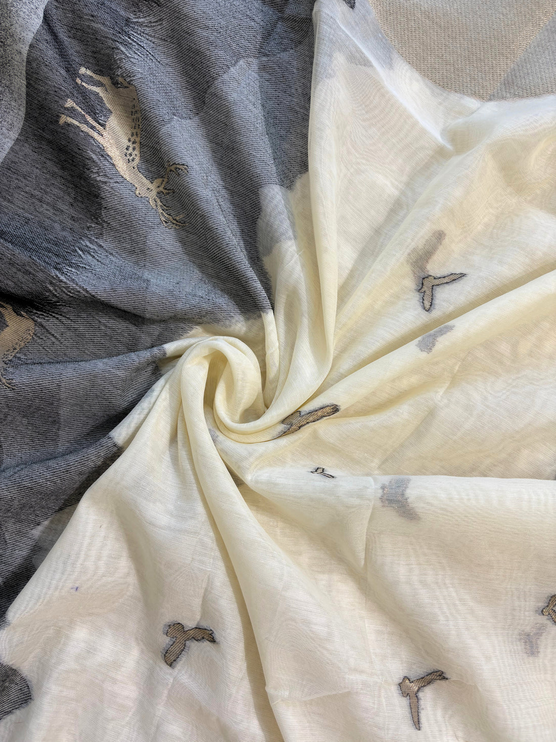 Grey and ivory Jamdaani suit with woven mountain, deer, and bird motifs, made with fine handloom weaving, perfect for winter and festive occasions.